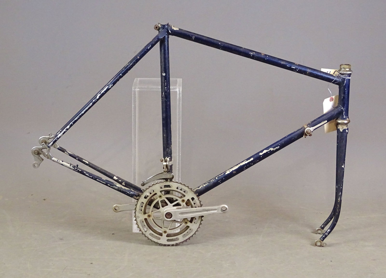 Unknown Maker Frame: Unknown maker frame: no wheels but forks are present with a headset complete with bearings, etc. Also present are the bottom bracket with a Stronglight chainring and pedal arms, and a Campagnolo