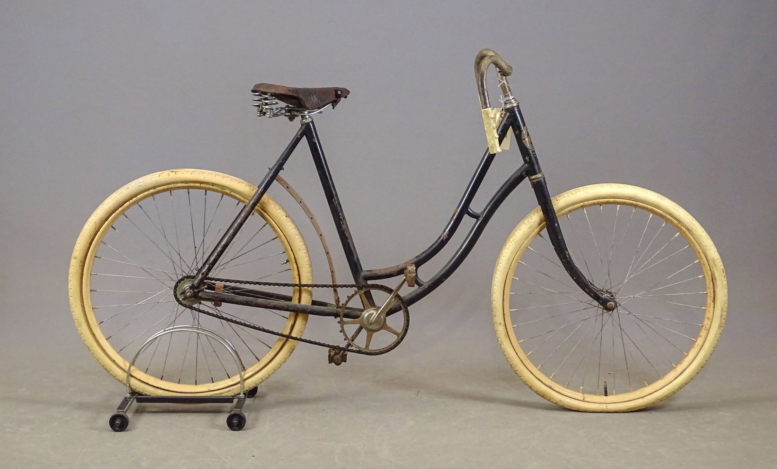 Columbia Safety Bicycle: Columbia Safety bicycle Model 58. Made in the 1890s. Broken fender, no skirt guard. Needs restoration. Gary Sanderson Collection.