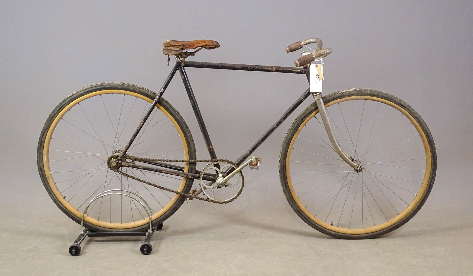 Pneumatic Safety Bicycle: Pneumatic Safety bicycle. Unknown maker: no head badge. 1900s. Nickel plated forks. The original leather seat on the bicycle needs restoration. The rear wheel's hub is an early model made by New Depar