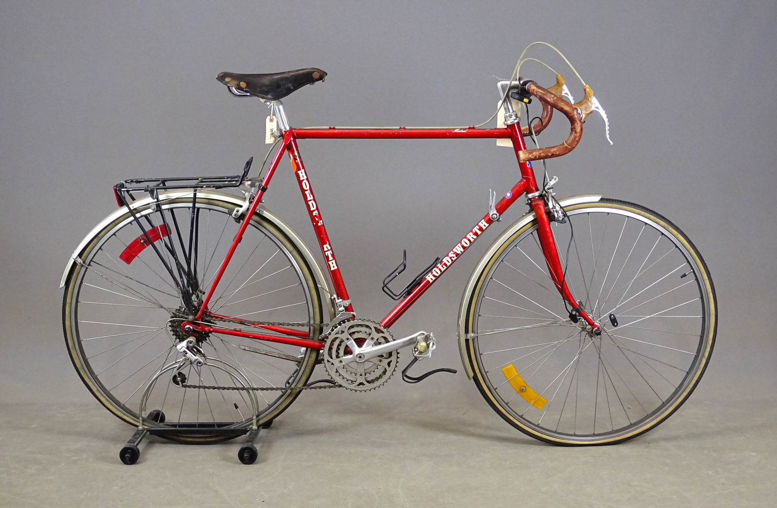 Holdsworth Racing Bicycle: Holdsworth - 25" racing bicycle (1960's). Made in England. Wheels: aluminum rims with 700C tires and tubes. Brake's = caliper's on front and rear wheel's with L. and R. lever's on handlebars. Gear