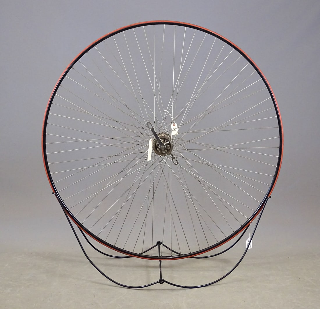 Whitney Replica Wheel: 54" Replica Ordinary (Whitney). Wheel with cut outs on flange sides to reduce weight made by James Spillane in his shop located in Madison Ct.. This wheel was made for Gery Sanderson to use in the 199