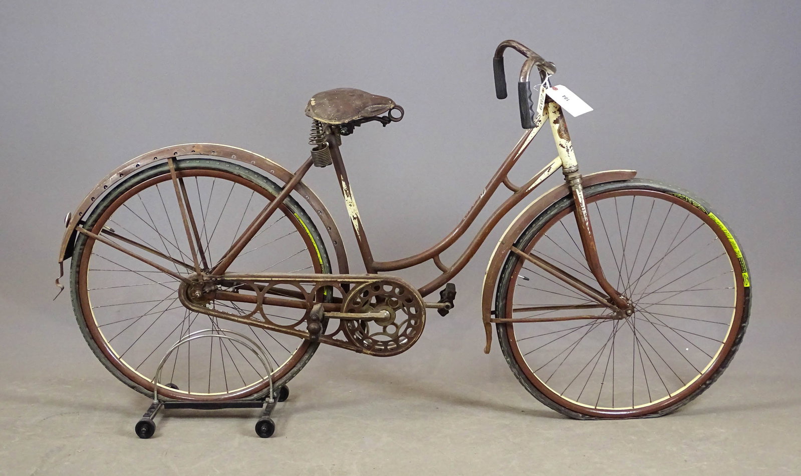 Mead Ranger Bicycle: Mead Ranger bicycle. 28" wheels with metal rims. Complete with tubular tires. Chain Guard with metal fenders. Made C. 1910-20's. Good condition. Gary Sanderson Collection.