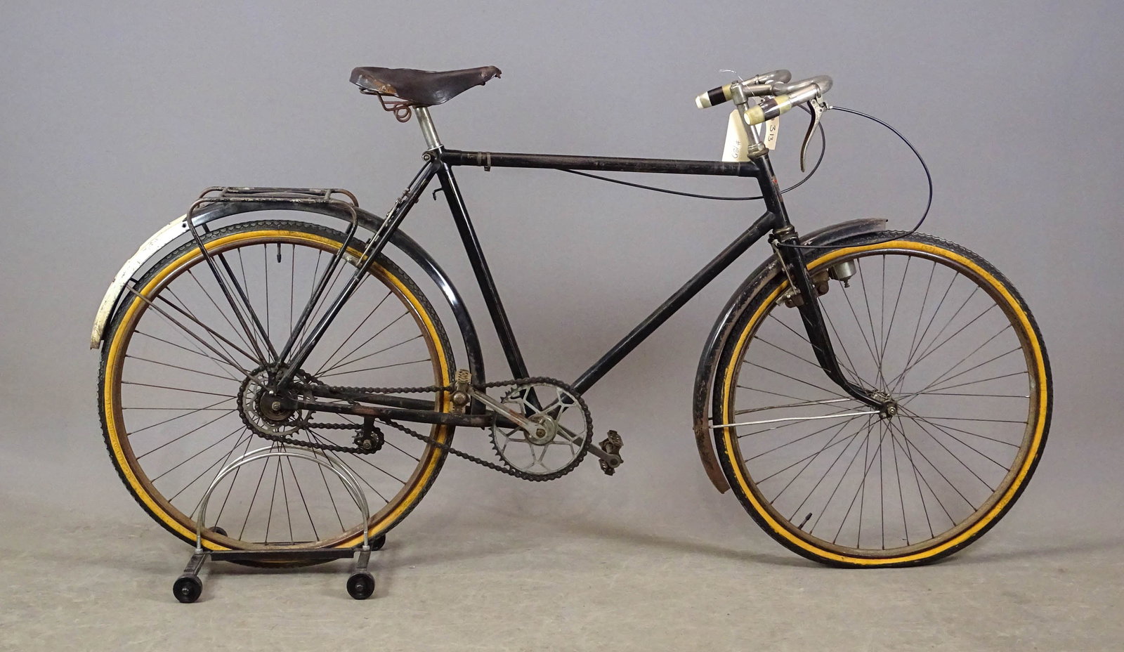 French Touring Bicycle: French Touring bicycle. Designed and made in St. Etienne, France, for touring in early to mid-1900s by the company D'Armes et Cycles St. Etienne. This bicycle has hand operated brakes using levers on