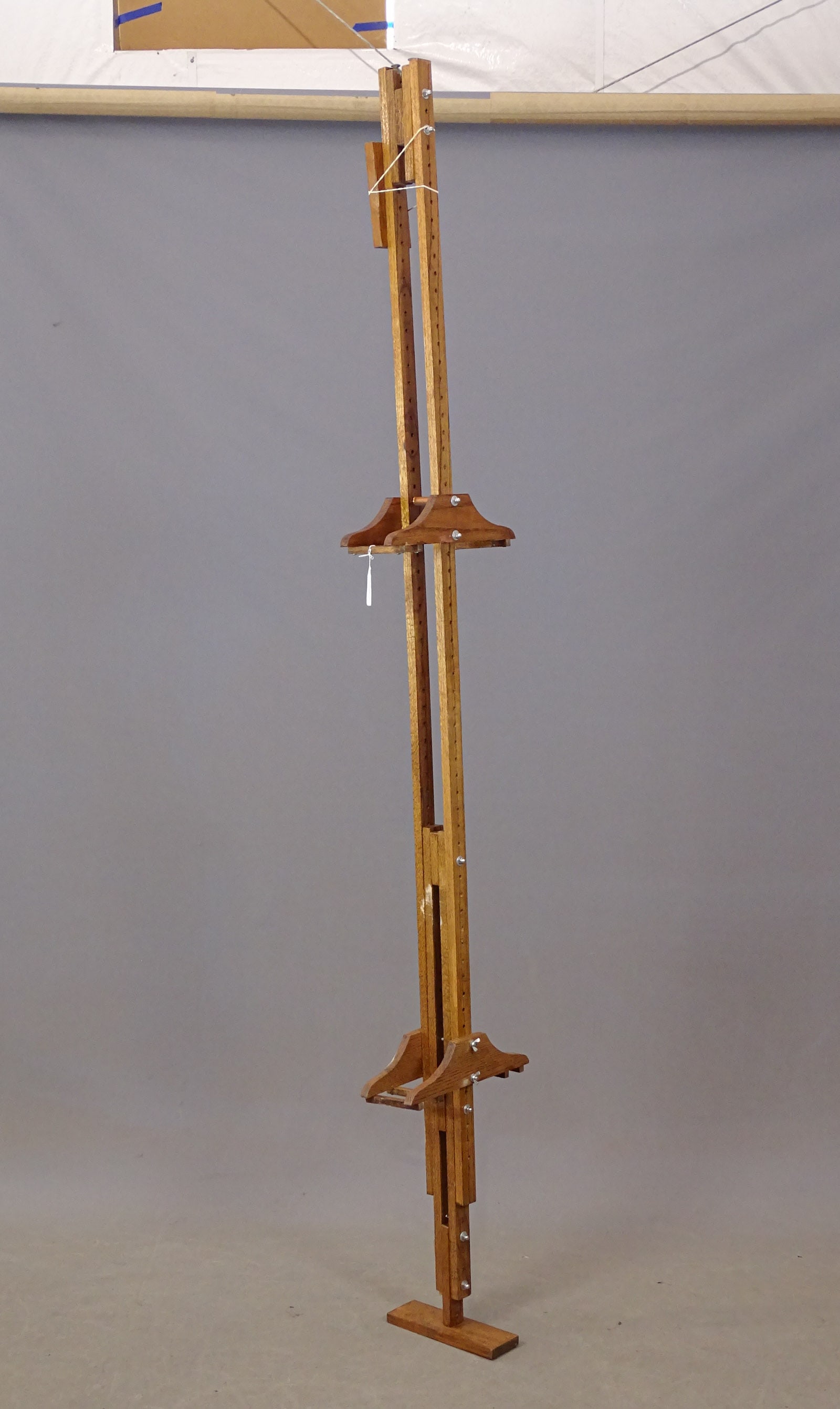 Bicycle Rack: Contemporary floor to ceiling wooden Safety bicycle rack. Adjustable 8' to 12'. Good condition.