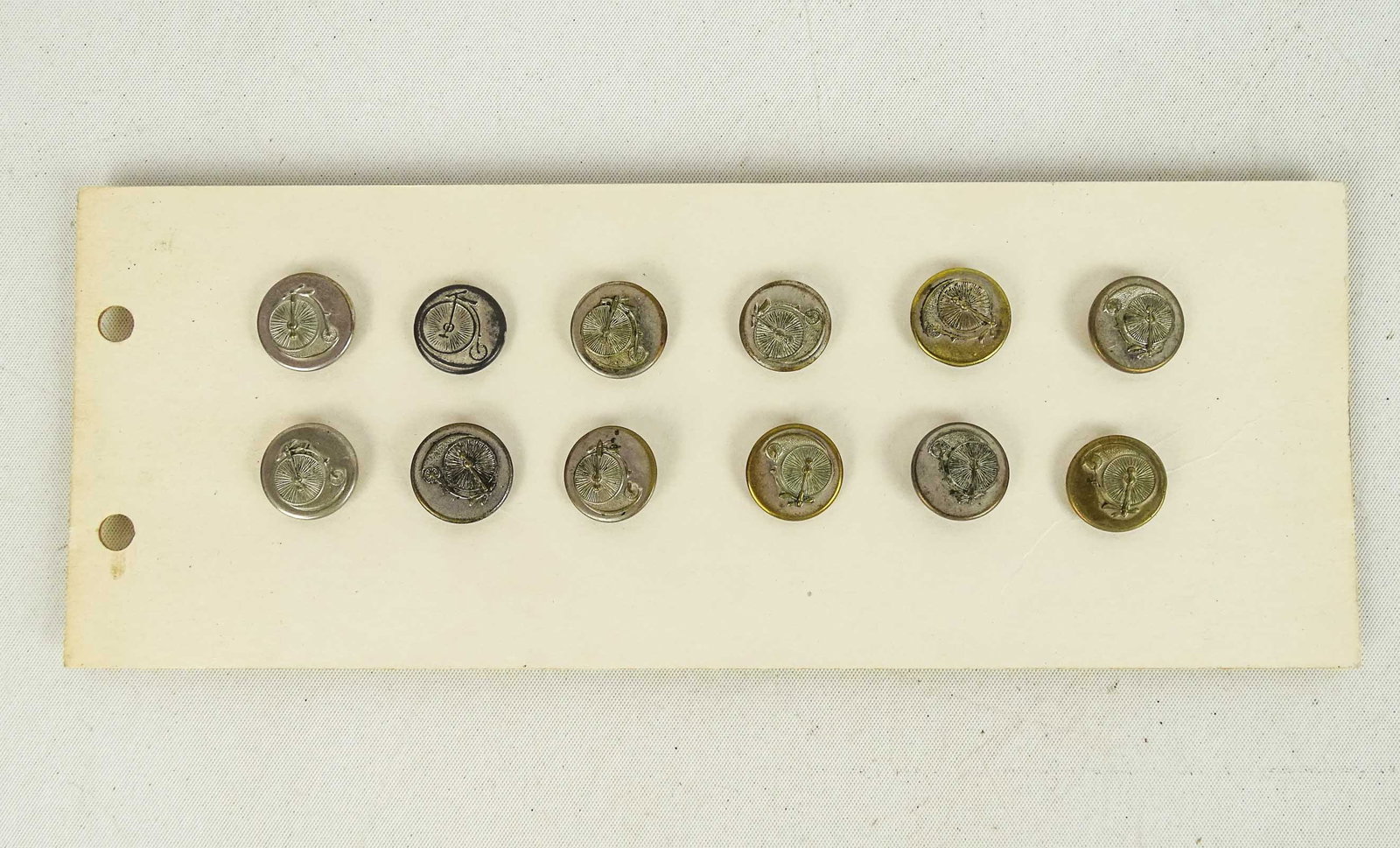 High Wheel Buttons: Collection (12) High Wheel Uniform nickel plated buttons. 5/8" D.. Good condition.