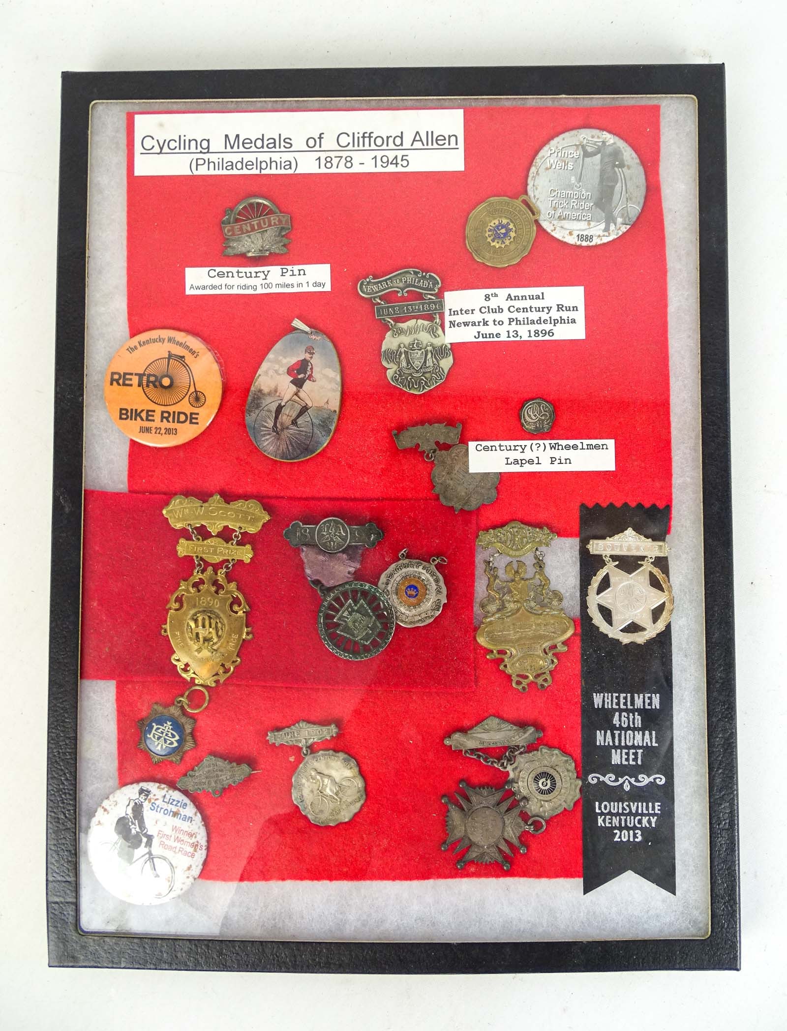Cycling Medals Lot: Cycling medals showcase lot. Clifford Allen (Philadelphia 1878-1945). Includes Century pin, Wheelmen lapel, 8th Annual Inter Club Century run medal etc.. Case included. Gary Sanderson Collection.