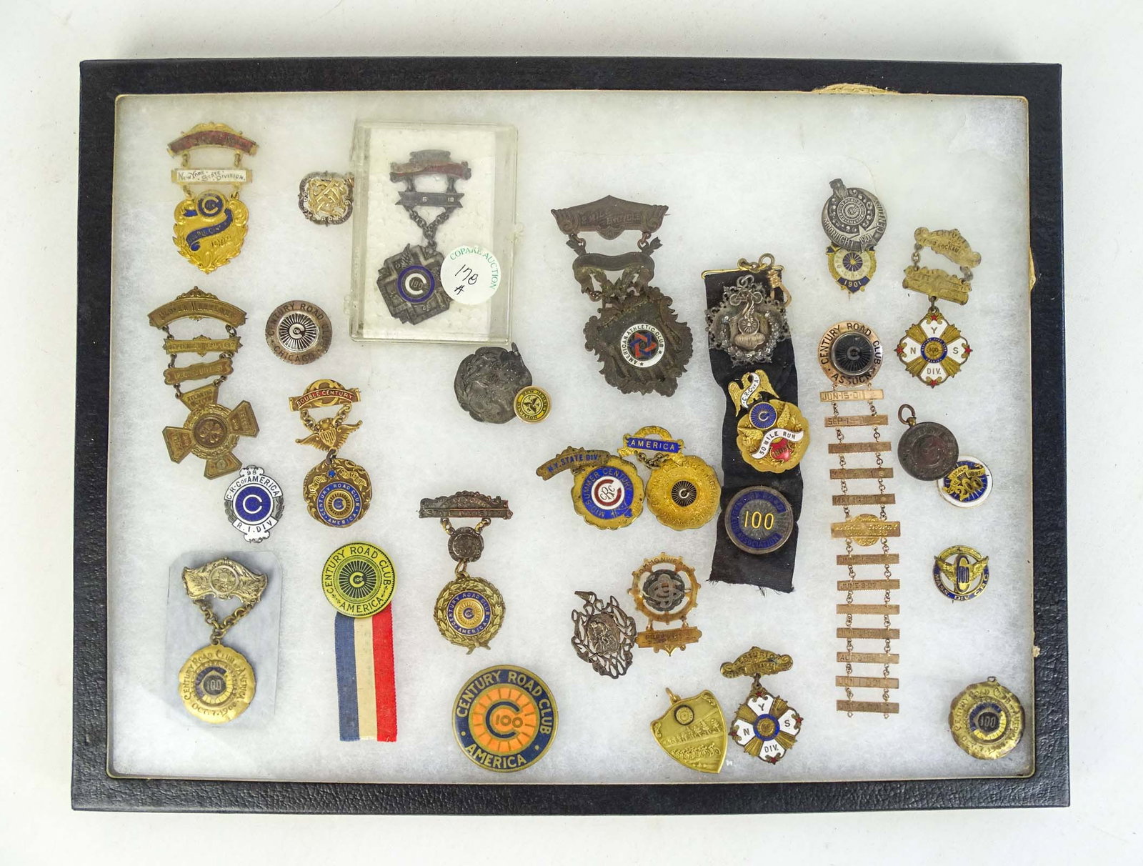 Cycling Medals Lot: Showcase lot of various cycling medals. Included Century Road Club. Case included. Gary Sanderson Collection.