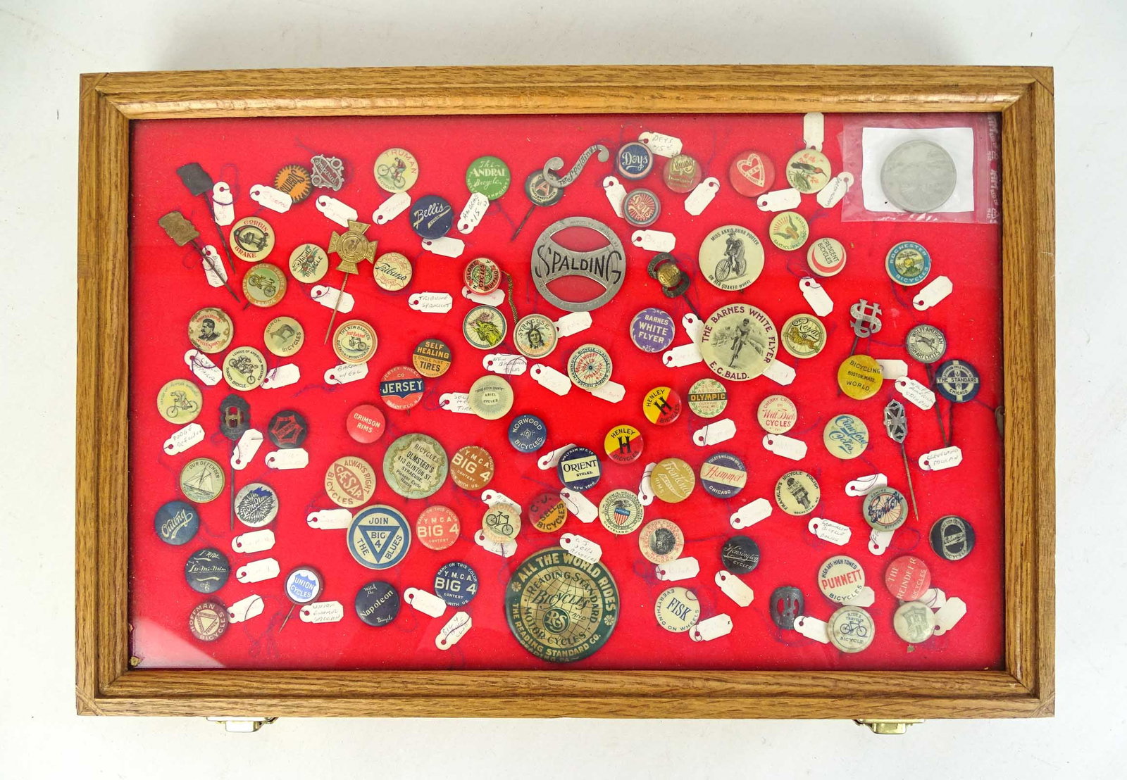 Bicycle Pinbacks: Showcase lot of early bicycle pinbacks: Includes The Barnes White Flyer, Reading Standard, Union, Punnet, Crescent, Corbin etc.. Case included. Gary Sanderson Collection.