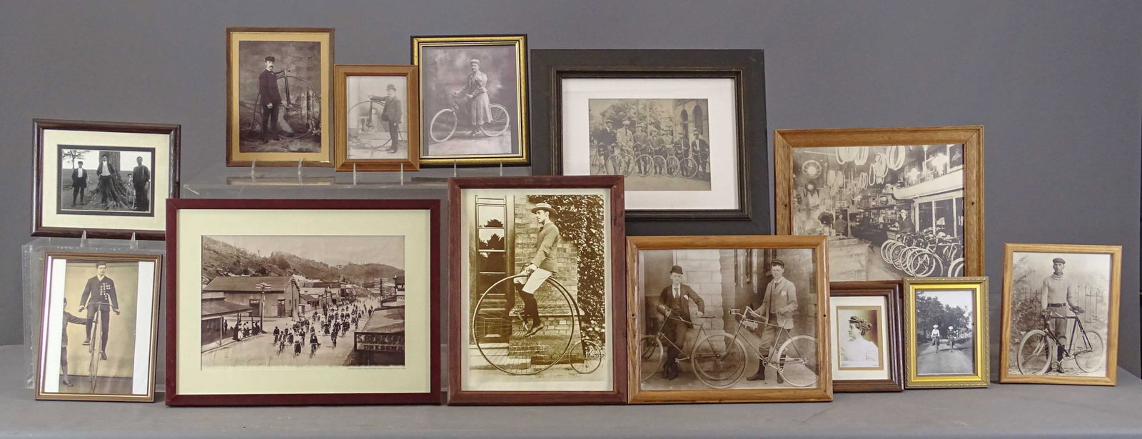 Bicycle Related Photographs: Lot of (13) various reproduction bicycle related photographs. Largest 15" x 20". Gary Sanderson Collection.