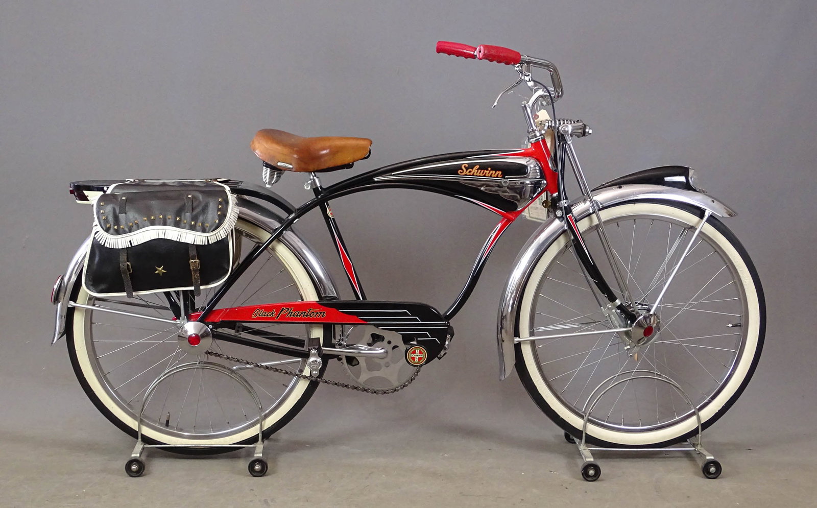C. 1950's Schwinn Phantom Bicycle: C. 1950's Schwinn Phantom 26" balloon tire bicycle. 18" frame. Schwinn saddle, Side saddles, hang tang, Royal Master Whitewall tires. Original.