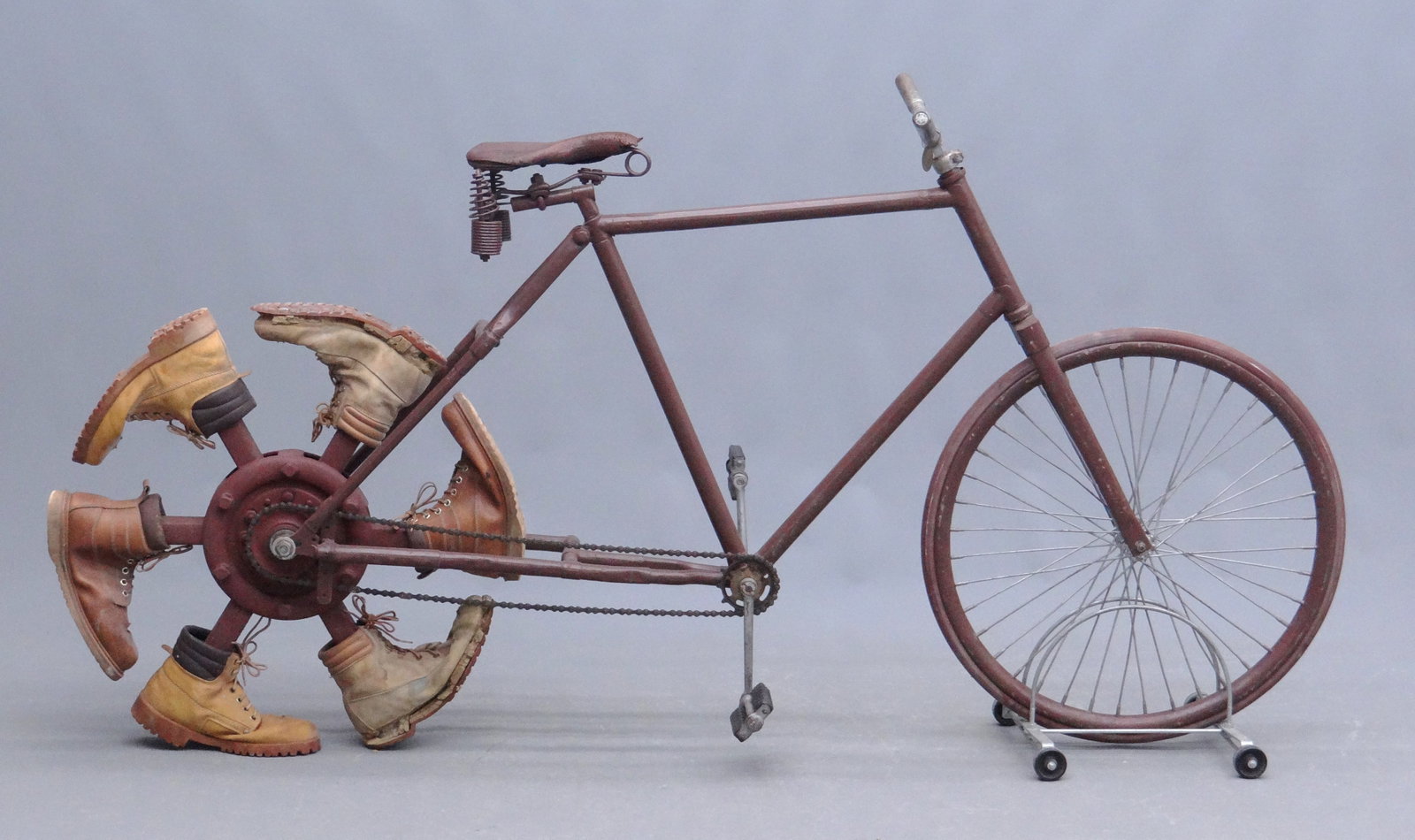 Unusual Clown Bicycle: Clown bicycle with boots for back wheel. Good condition. 38" Ht., 76" length. David Metz Museum. Previously sold at Copake Auction April 2014, lot 288