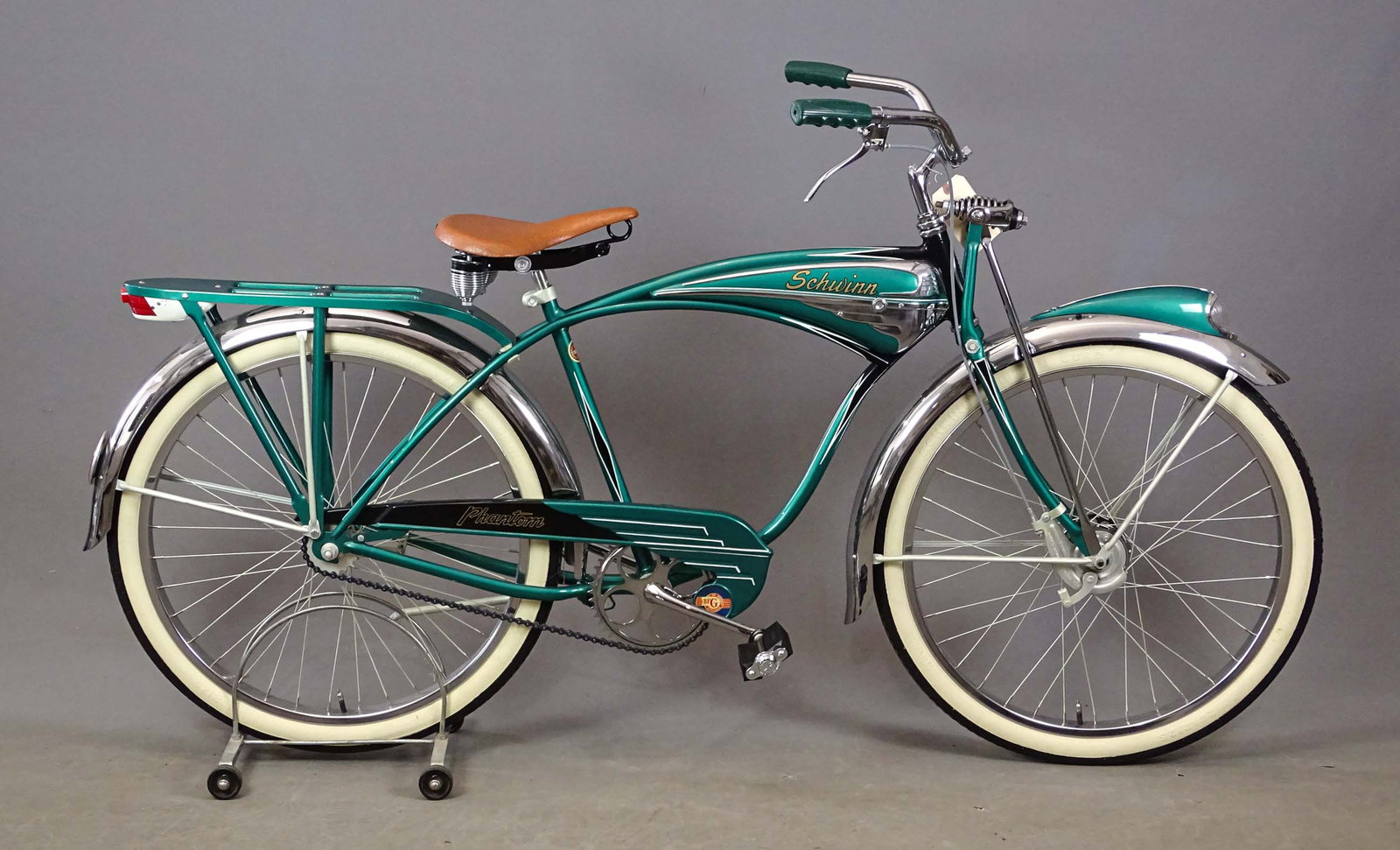 C. 1950's Schwinn Phantom Bicycle: C. 1950's Schwinn Phantom balloon tire bicycle. Green example. 18" frame. Restored. Schwinn Typhoon Cord Whitewall tires.