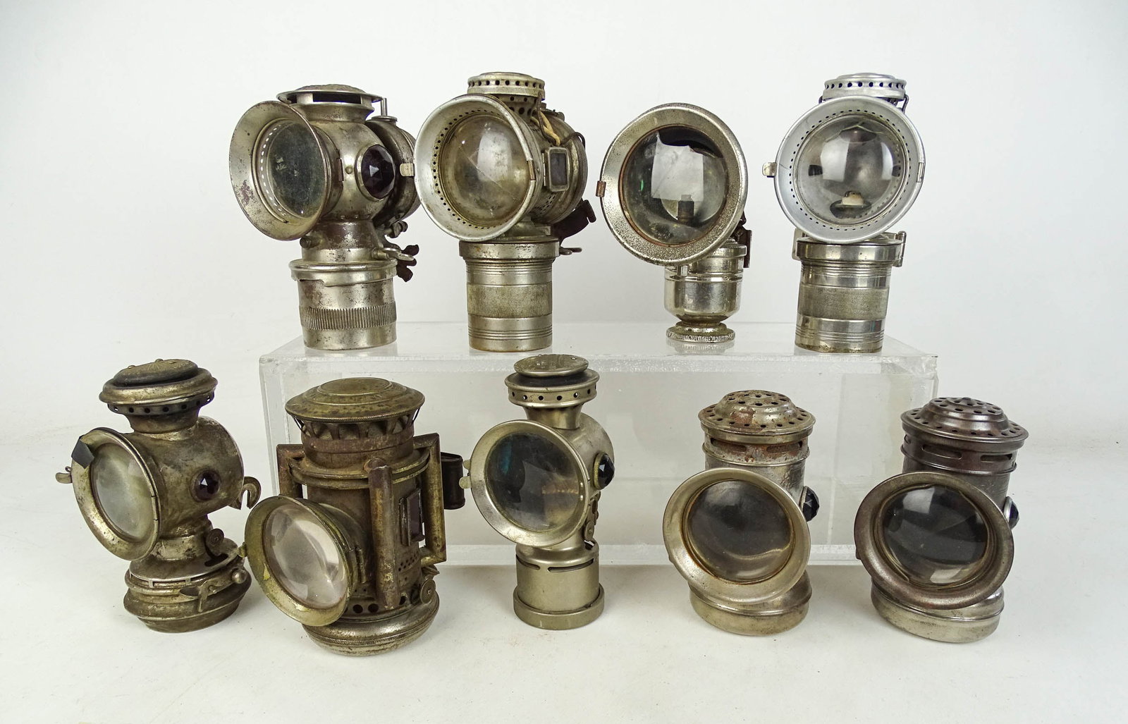 Collection of Bicycle Lamps: Lot (9) early bicycle lamps. Fair-Good condtion. Gary Sanderson Collection.