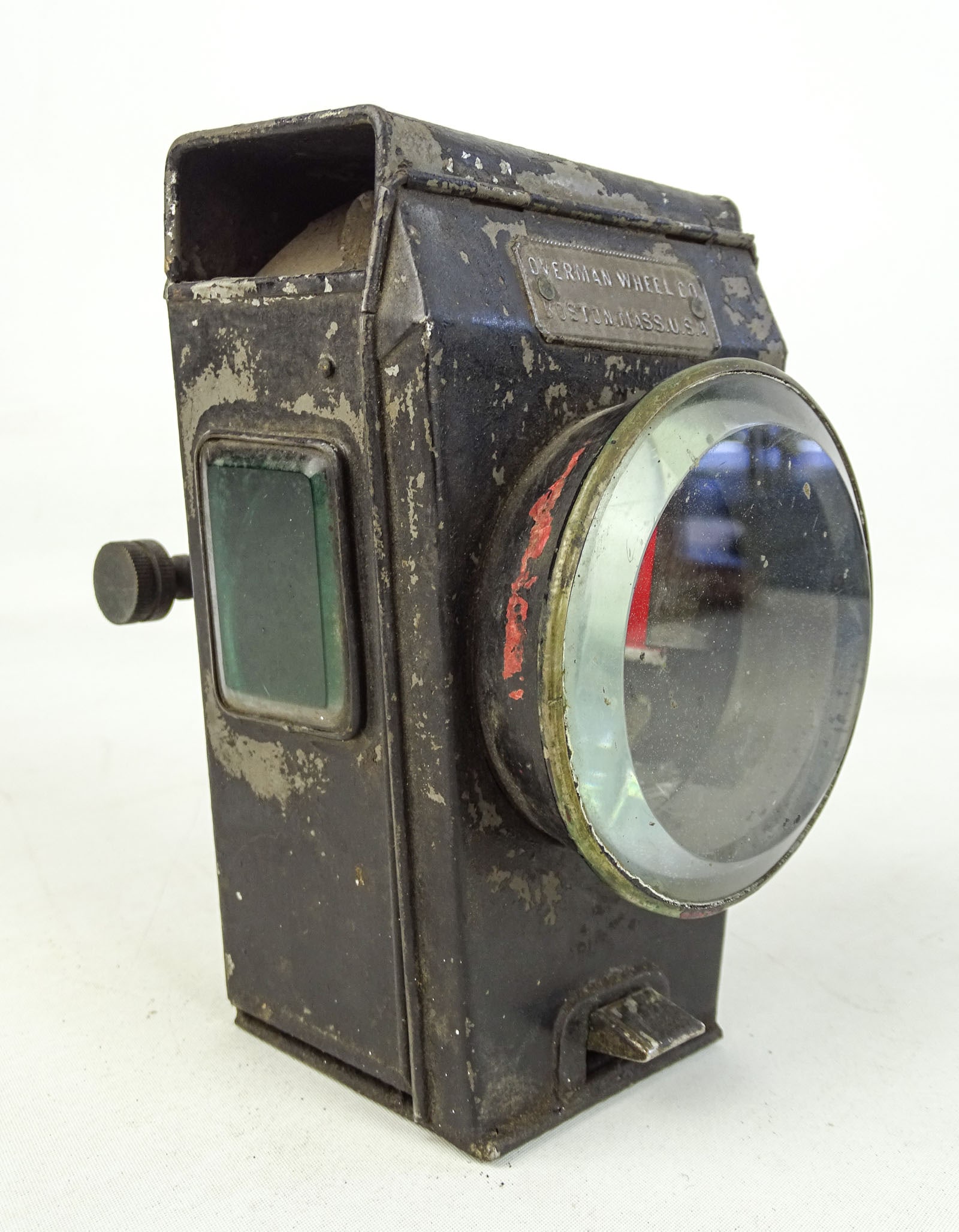 Bicycle Hub Lamp: Bicycle hub lamp marked "OVERMAN WHEEL CO.". 6 3/4" Ht.. Fair condition. Gary Sanderson Collection.