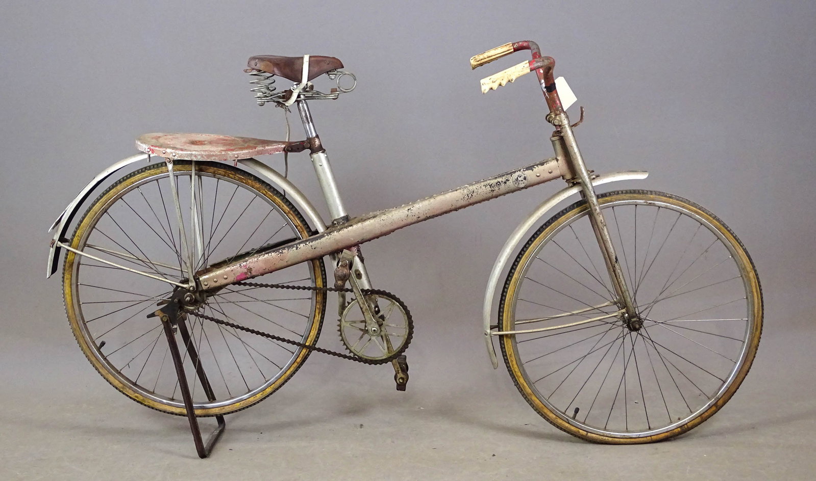 Unusual Riveted Custom Bicycle: Unusual riveted custom "make do" bicycle. Fair condition. Mark Mattei Collection.