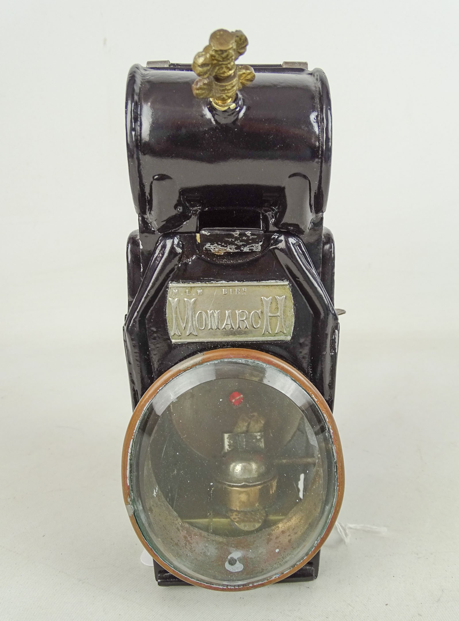 Monarch Bicycle Lamp: Monarch bicycle lamp "Monarch of the Road Hub Lamp". 8" Ht.. Side panels cracked. Good condition.
