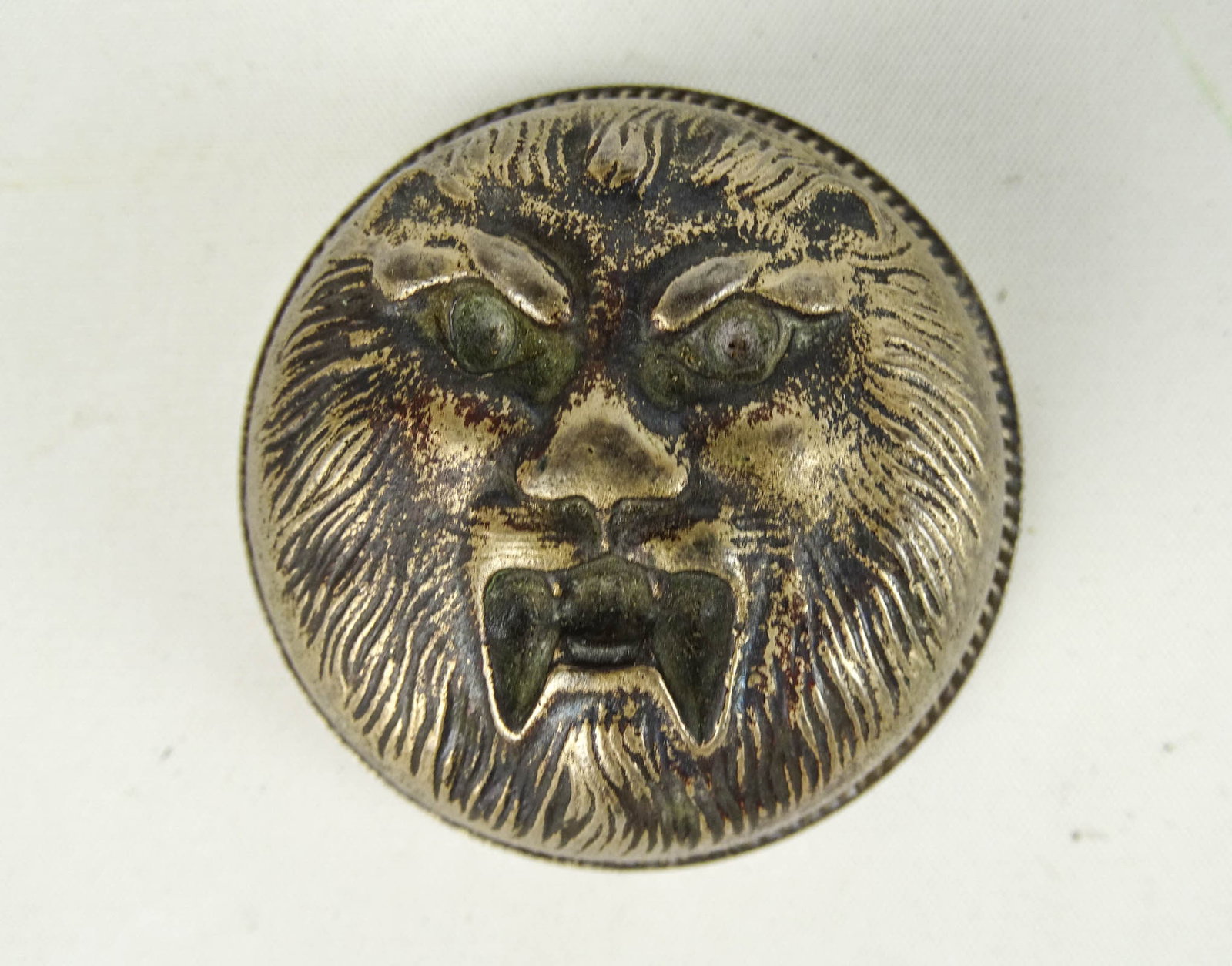Lion Bell Top: Lion embossed bell top. Good condition.