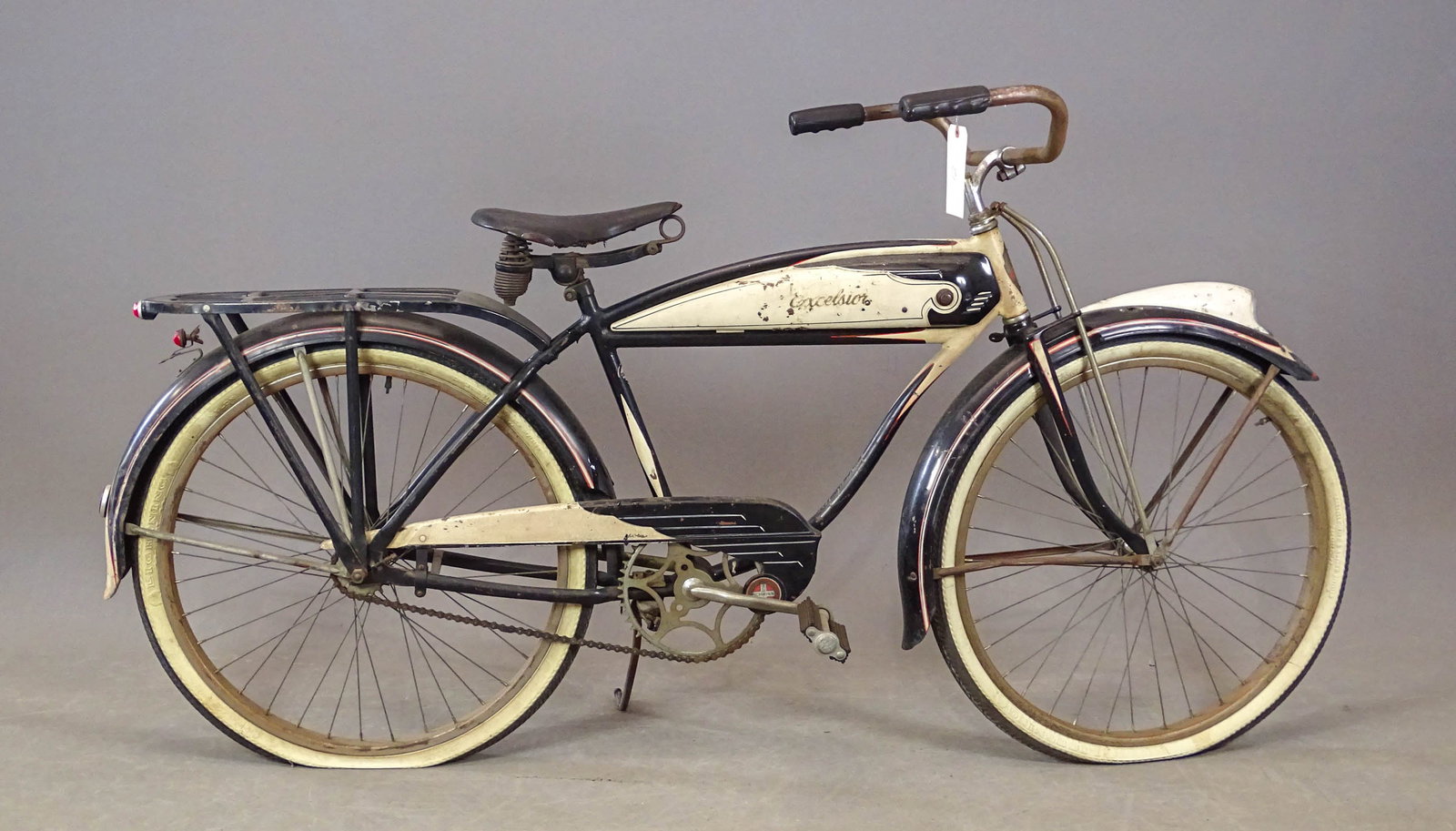 Schwinn Excelsior Bicycle: Pre-War Schwinn Excelsior tank bicycle. Rear rack. Fender has light (missing lens). Barn fresh condition. 18" frame.