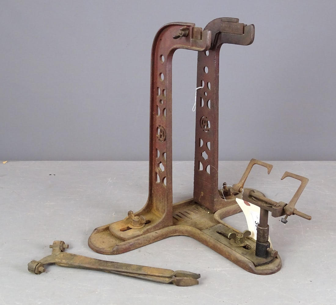 Bench Truing Stand: Original cast iron bench mount wheel truing stand "DA" - complete. Good condition. Glenn Eames Collection Burlington Vermont.