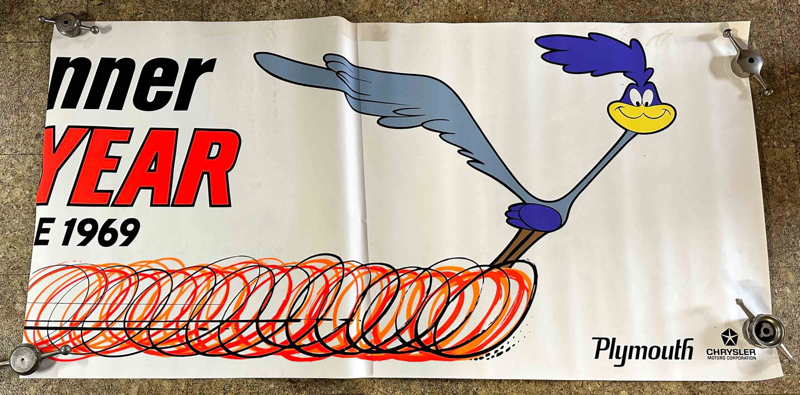 Plymouth Lot: 1969 Plymouth Road Runner Car of the Year large two piece poster, original factory issued, 71 x 36, (rolled and covered for shipment, no blue tape on any poster surface).