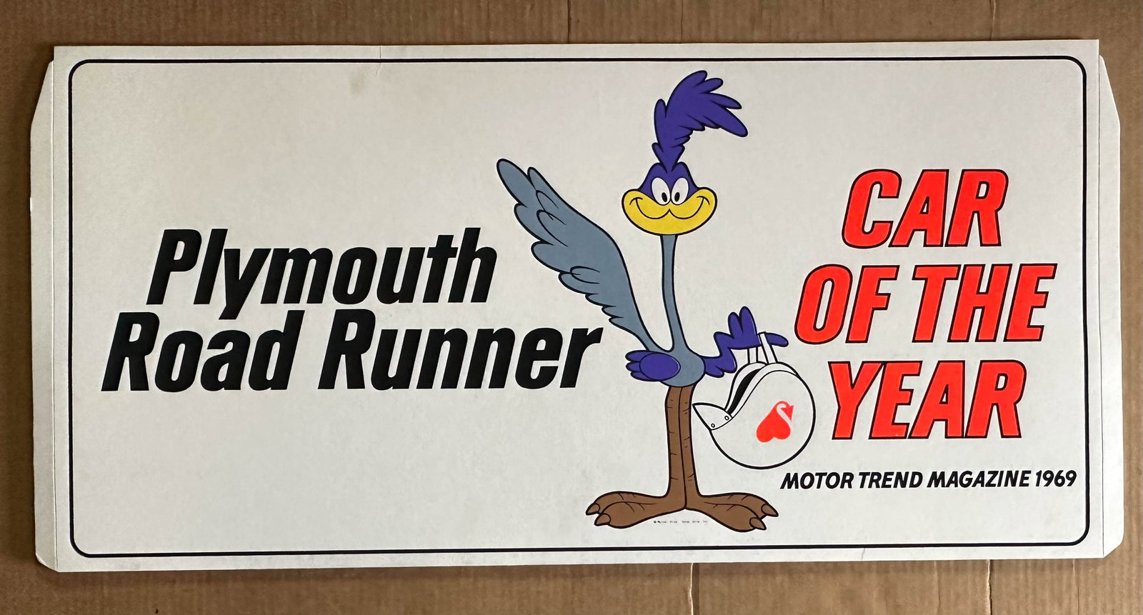 Plymouth Lot: Plymouth road runner dealer display, dated 1969, in original factory mailer, 32 x 15.