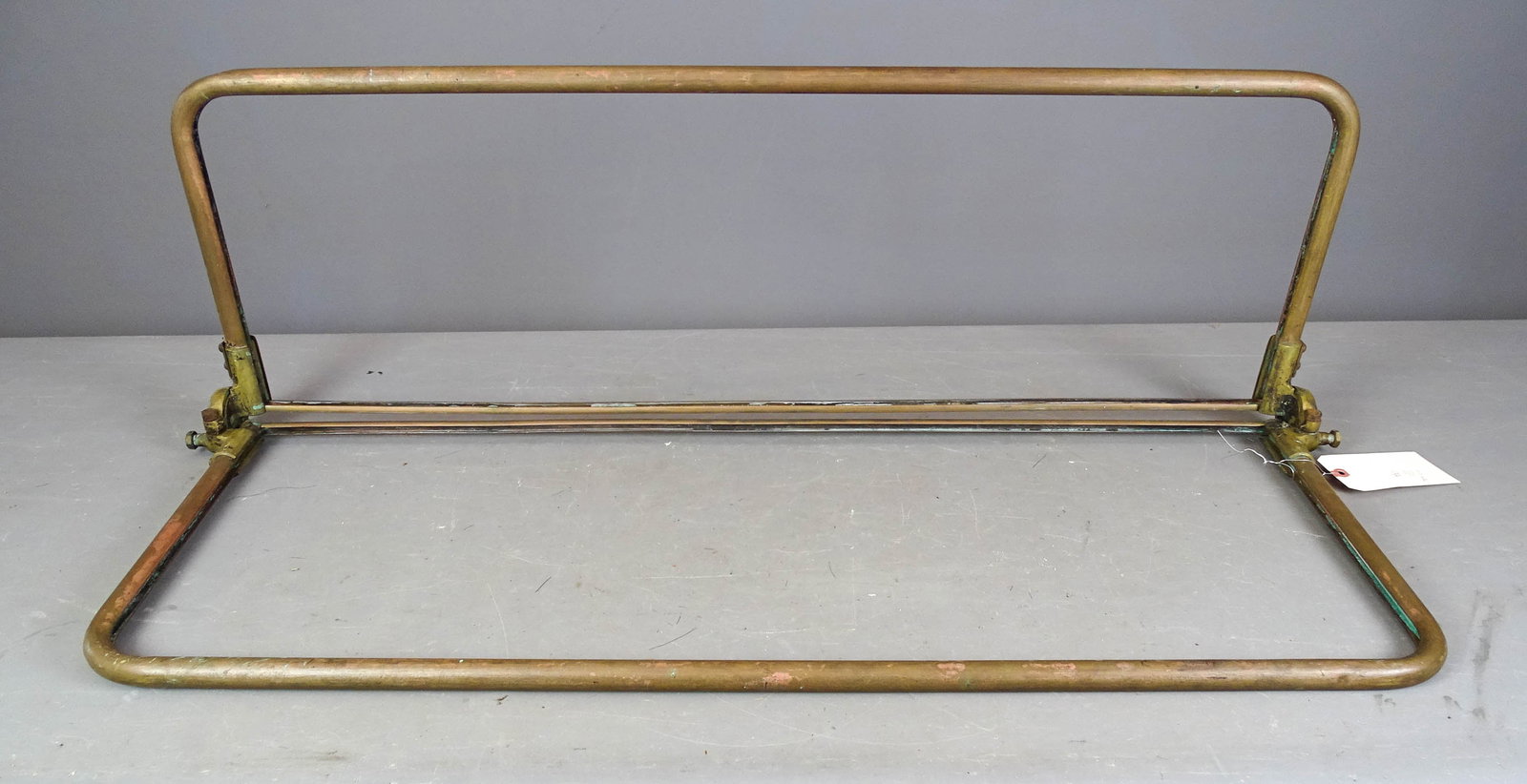Brass Windshield: Early brass windshield. 40" x 27". Good condition.