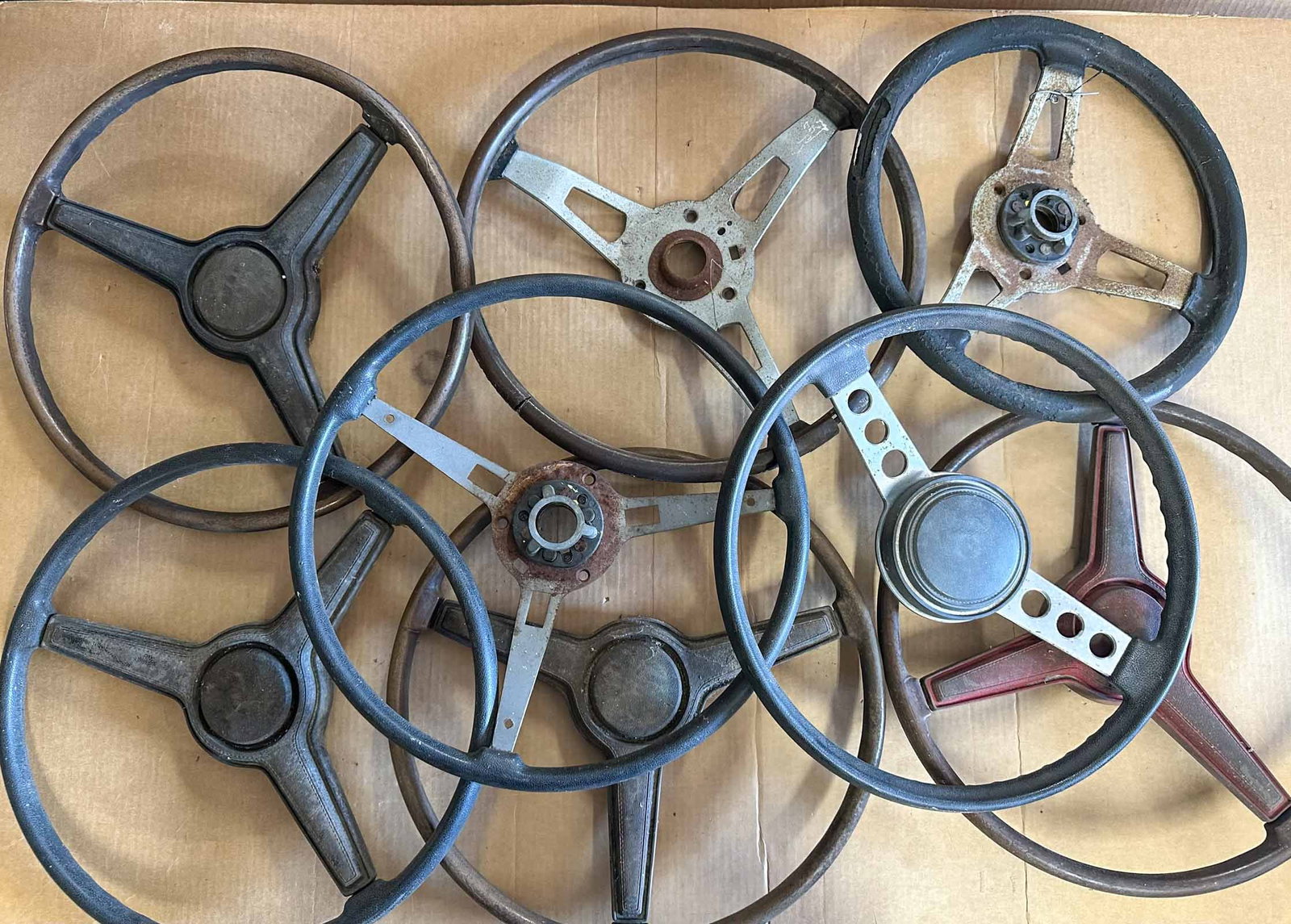 Steering Wheels: Steering wheels - eight from Mopar models late 1960's - early 1970's, Barracuda, Road Runner, etc. including a few accessory wheels.