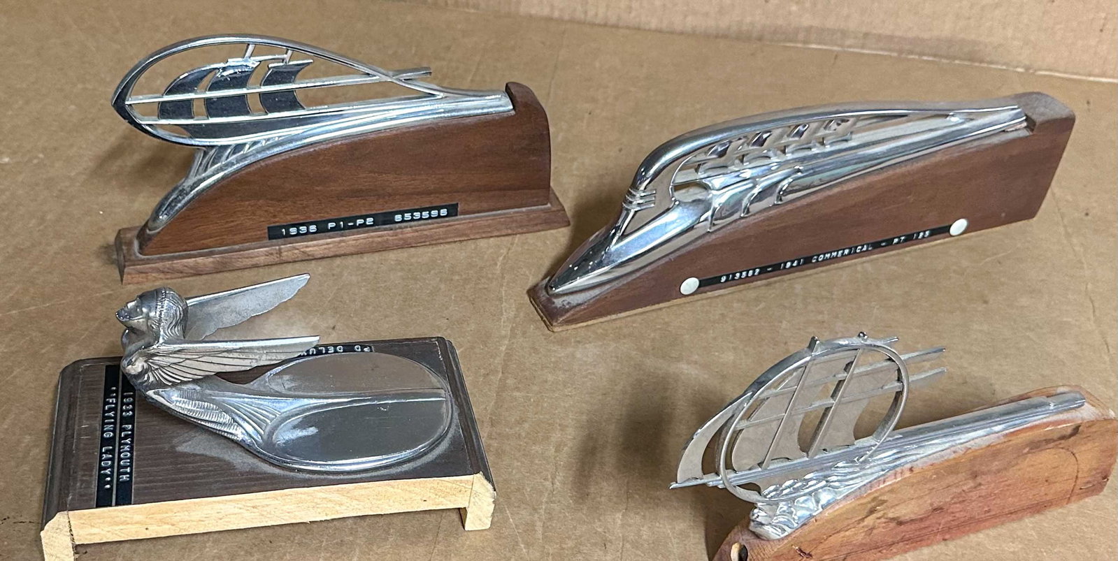 Plymouth Lot: Four original Plymouth hood ornaments - 1931- 32, Goddess, 1934-35, 1936, Mayflower, 1941 Commercial.
