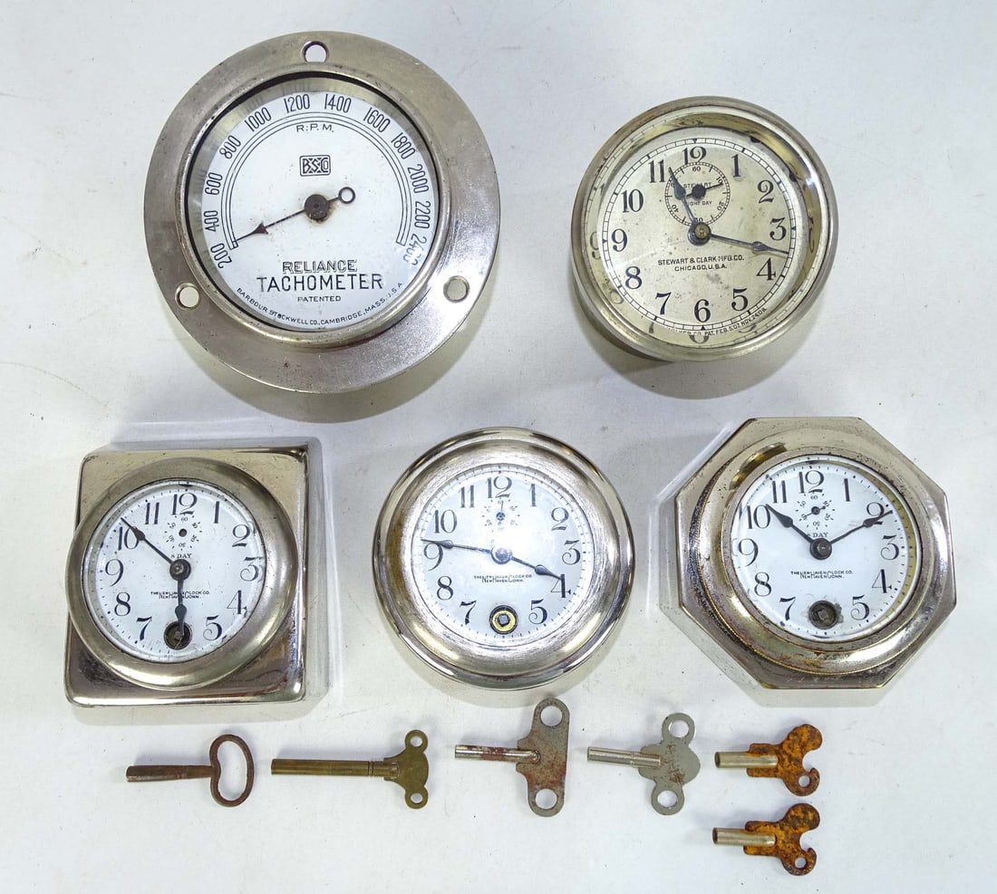 Automobile Clocks: Lot (5) early automobile clocks including. (3) New Haven, 1-Stewart, Reliance Tachometer. Good condition.