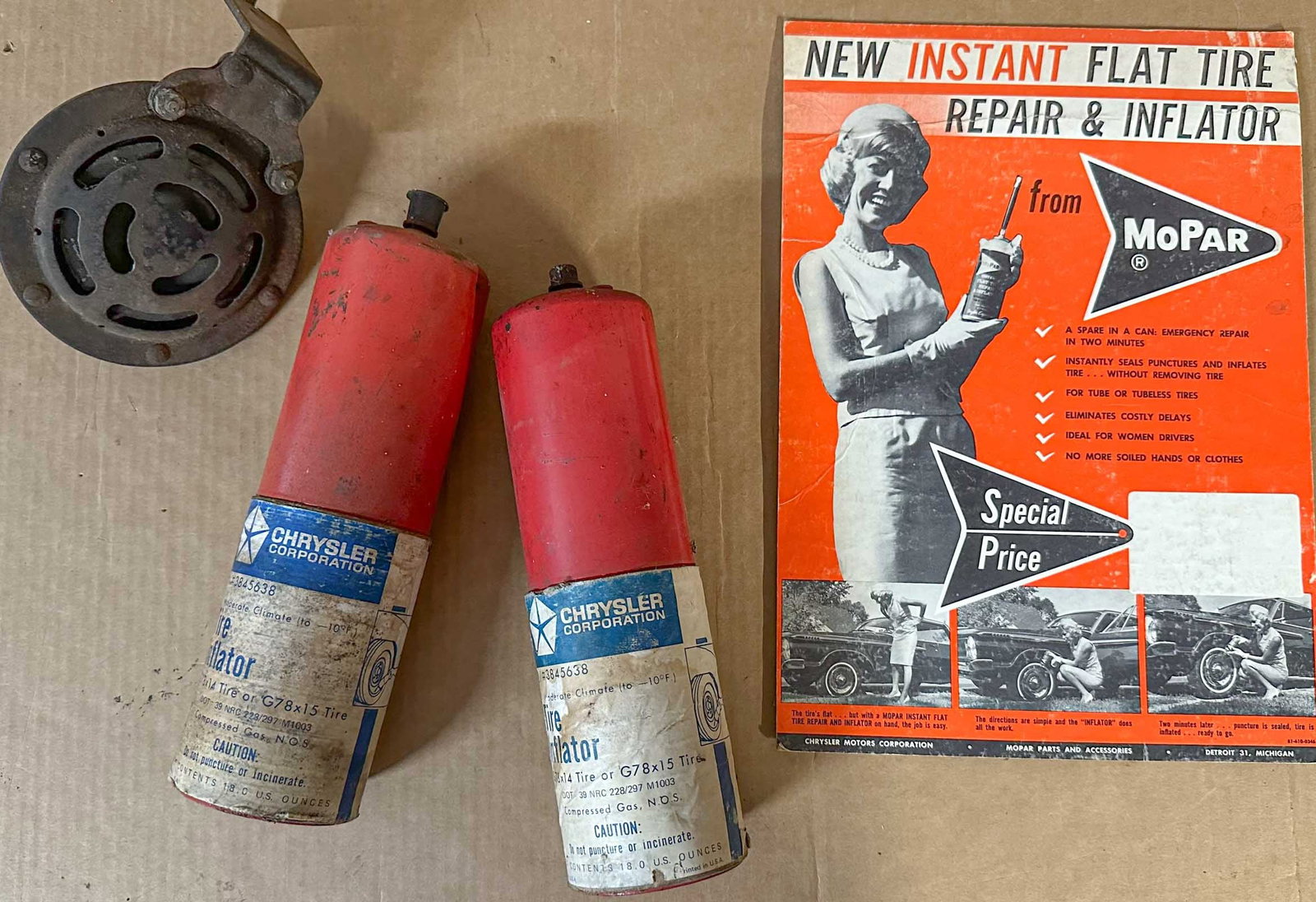 Misc. Lot: Original black paint late 1960's Plymouth Road Runner "Beep-Beep" horn, two Chrysler Corp tire inflators, Mopar part number 3845638 and 10 x 14 dealer display card.