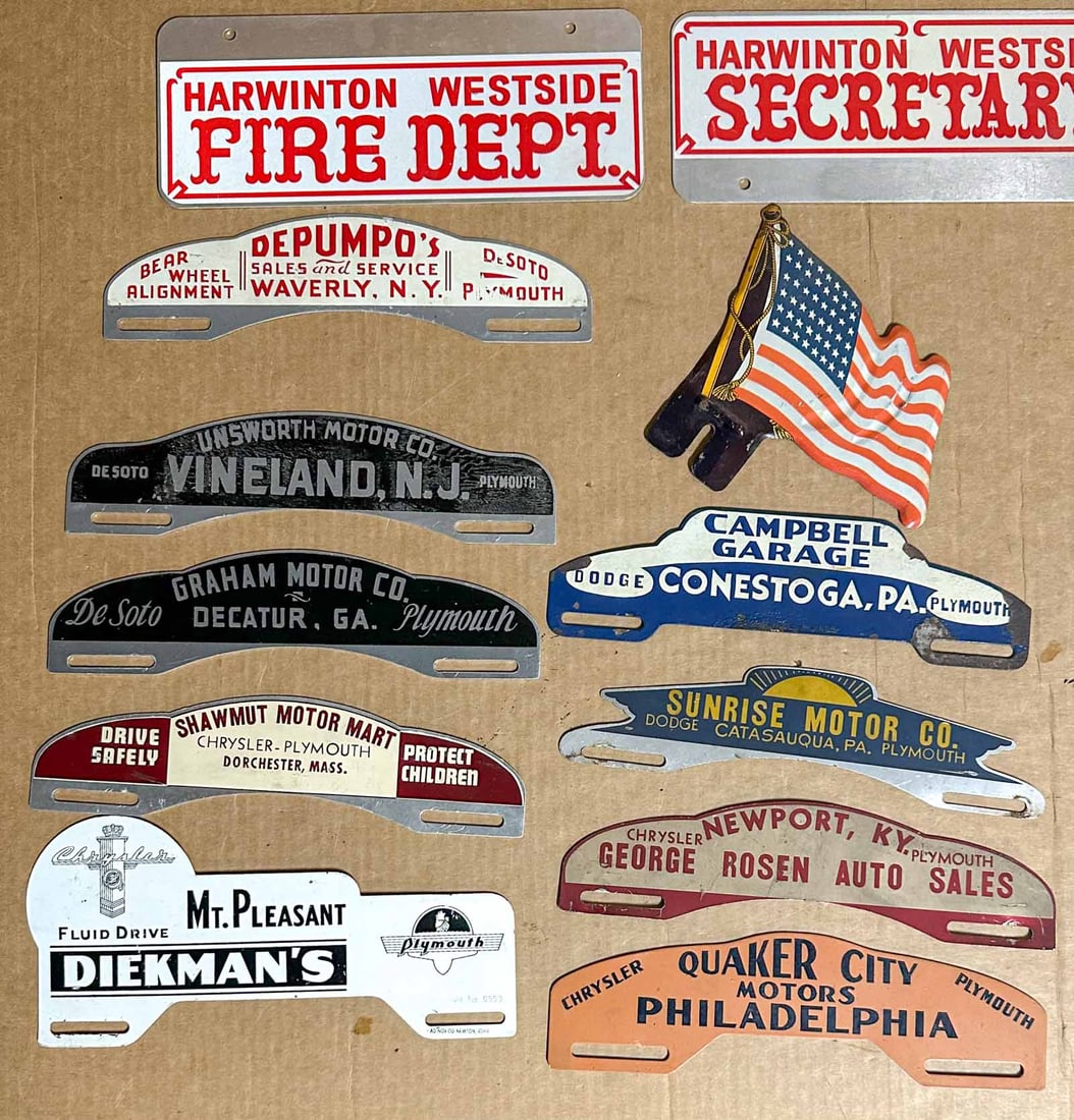 License Plate Toppers: Collection of license plate toppers, most are Mopar related.