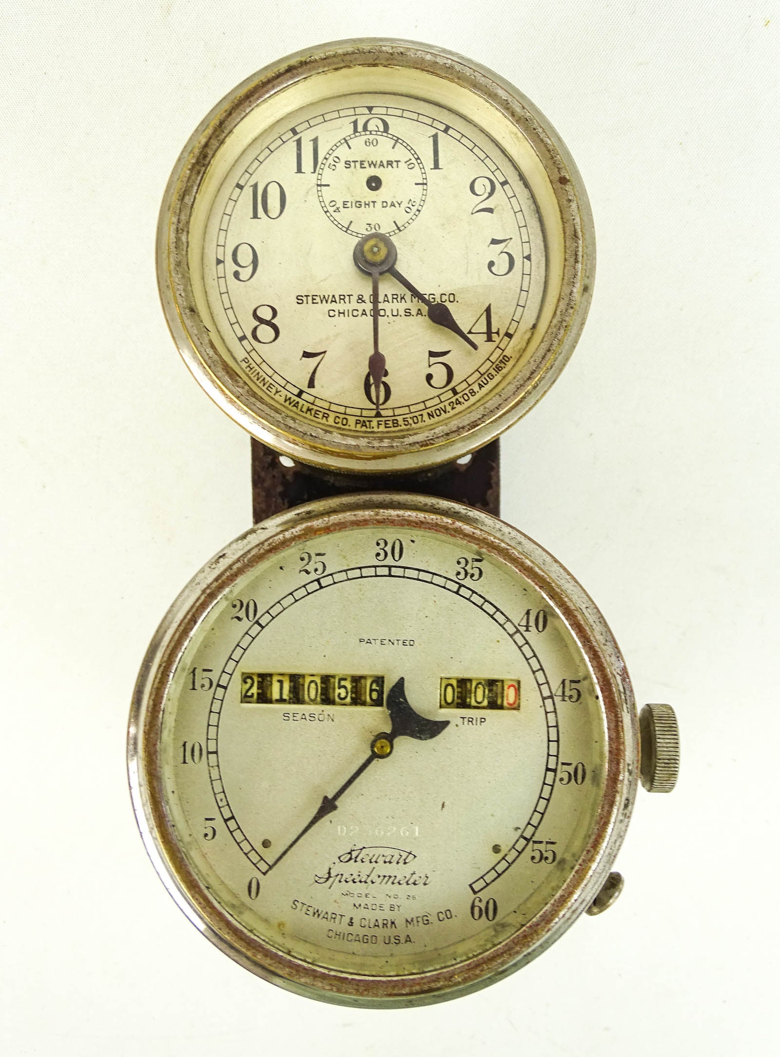 Stewart Speedometer: 1912 Stewart speedometer/clock/bracket. 60MPH. Good condition.