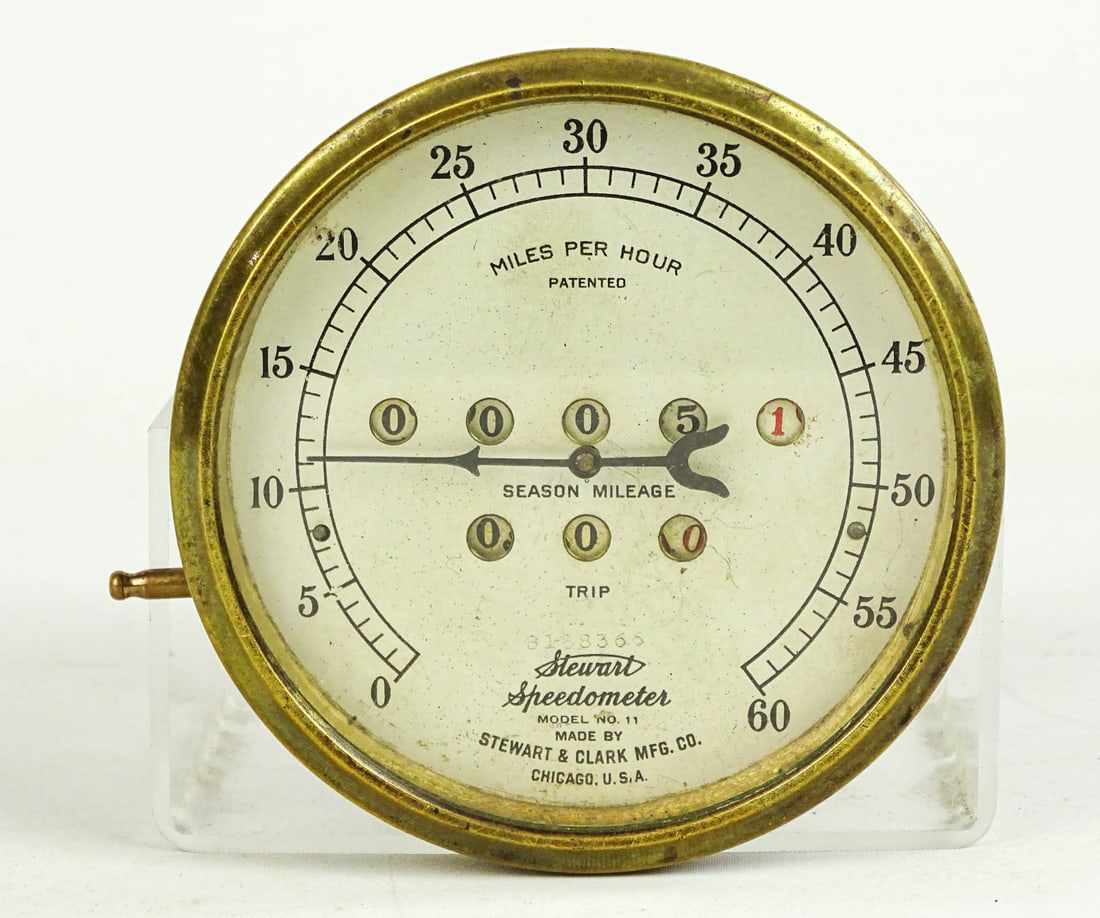 Stewart Speedometer: 1910 Stewart speedometer with bracket. 60MPH. Good condition.