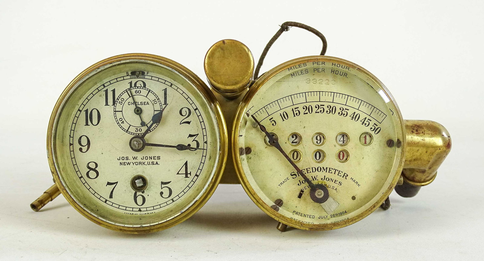 Jones Speedometer: Jones 50MPH speedometer & Chelsea clock. Good condition.