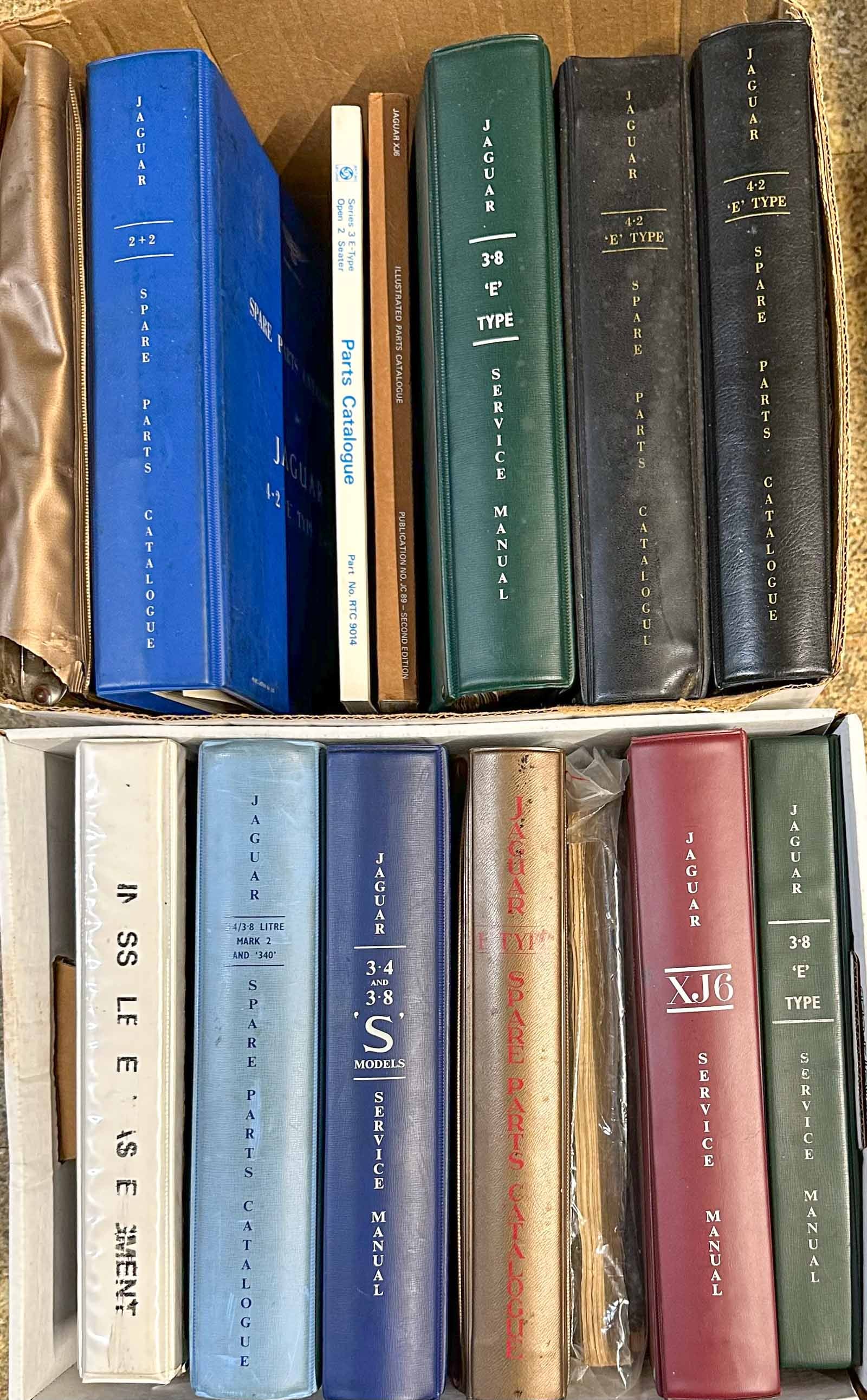 Jaguar Lot: Jaguar parts, service manuals and brochures, 1940's - 1980's, two full bankers boxes, most are E Type.