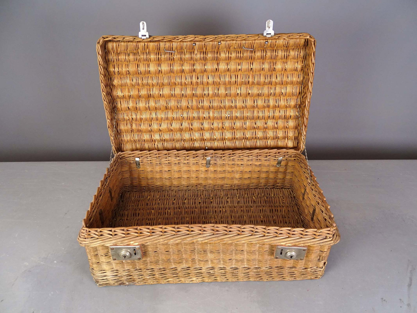Wicker Automobile Trunk: Wicker automobile trunk. 16 1/2" x 27" x 9". Good condition.