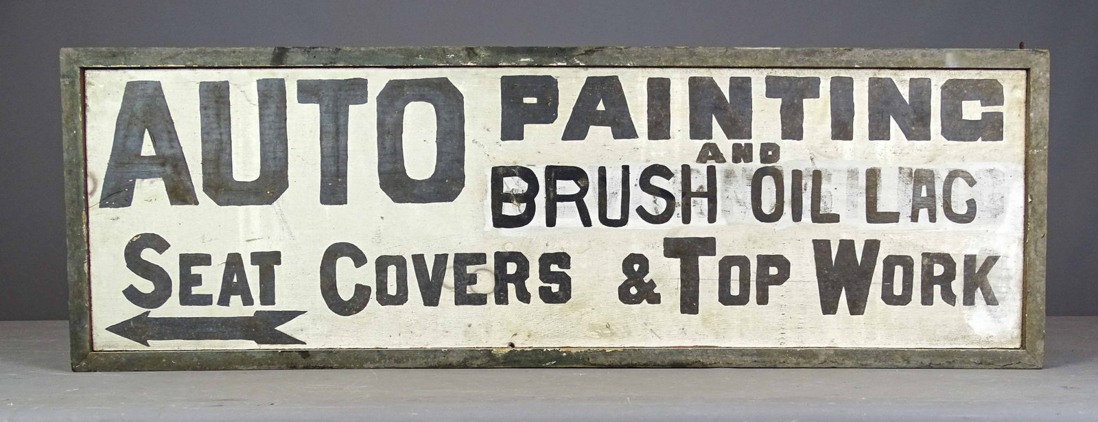 Trade Sign: Painted wooden trade sign "AUTO PAINTING AND BRUSH OIL LAC SEAT COVERS & TOP WORK". 13" x 40".