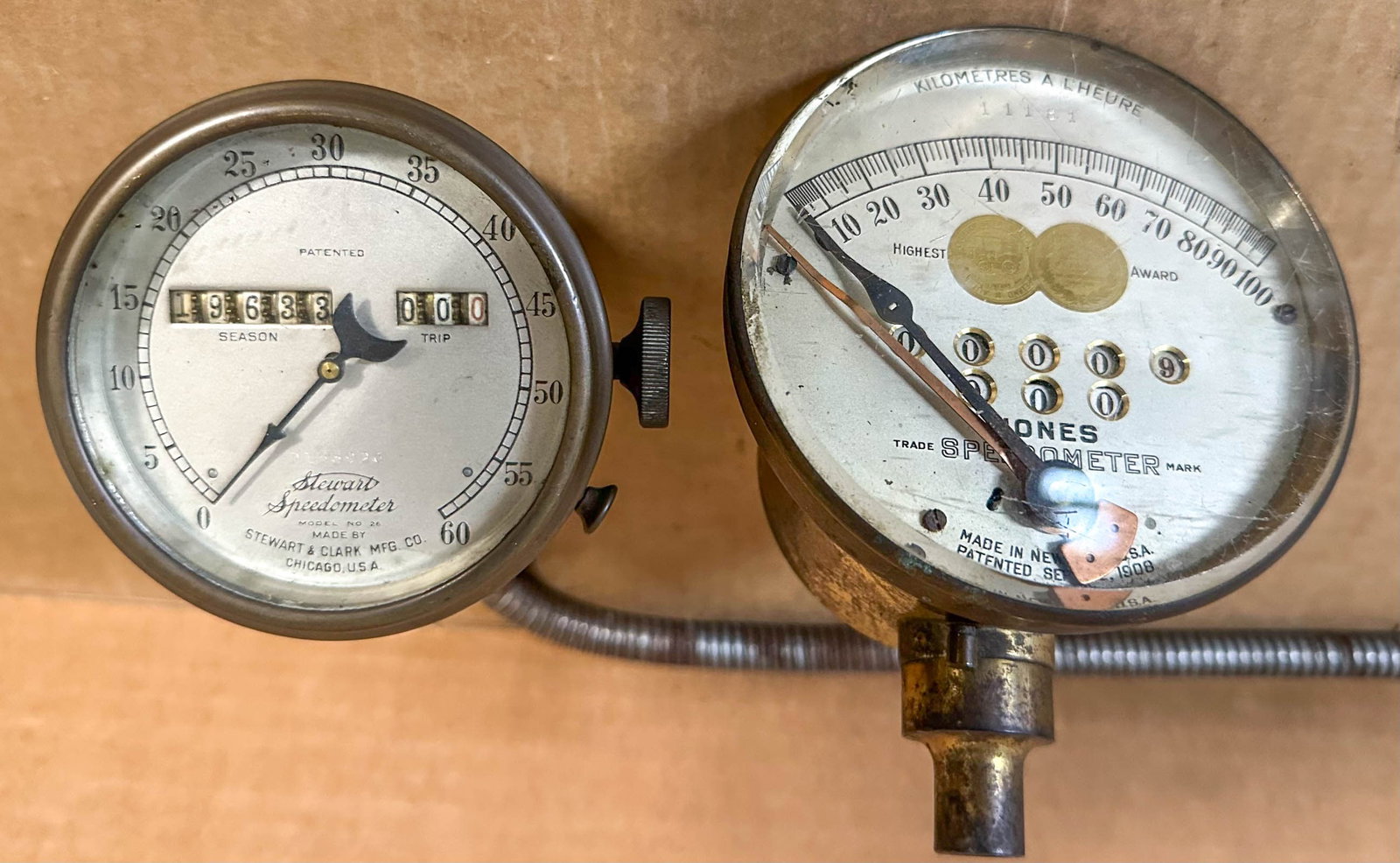 Speedometers: Two brass era speedometers - Jones 100 MPH and Stewart 60 MPH.