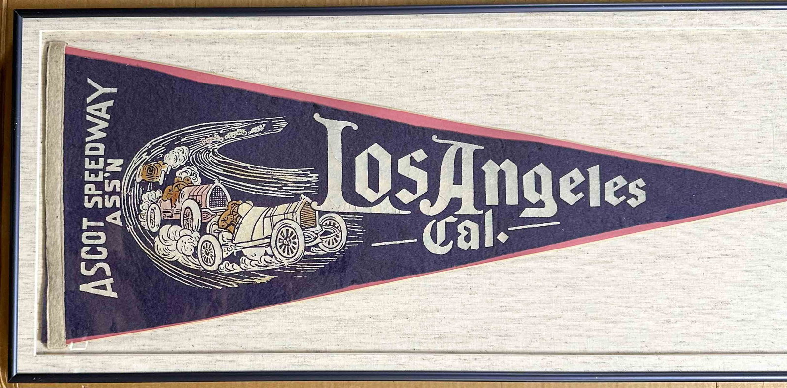 Racing Pennant: Ca 1912 - 1914 Ascot Speedway Ass'n, Los Angeles, CA race pennant, 29 x 11, matted and framed.