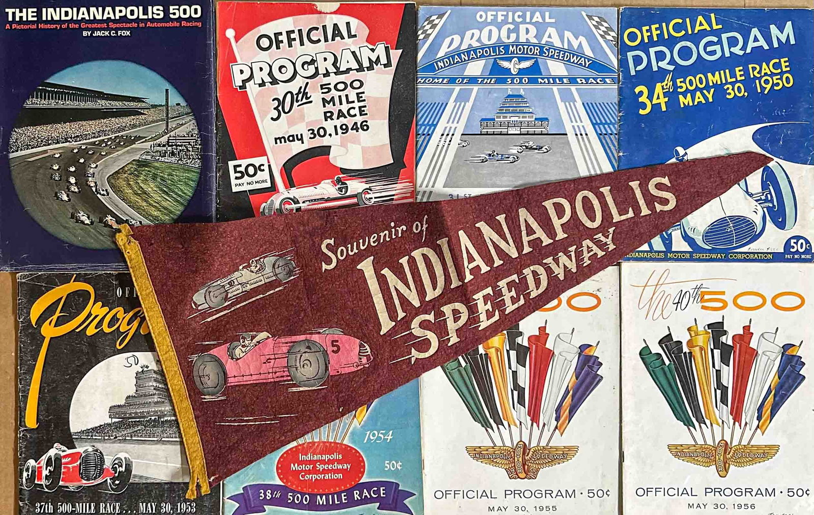 Indy 500 Pennant: Indy 500 pennant, ca 1940's, 1946, 1947, 1950, 1954, 1956 Indy 500 programs, Jack Fox Indy 500 history book.