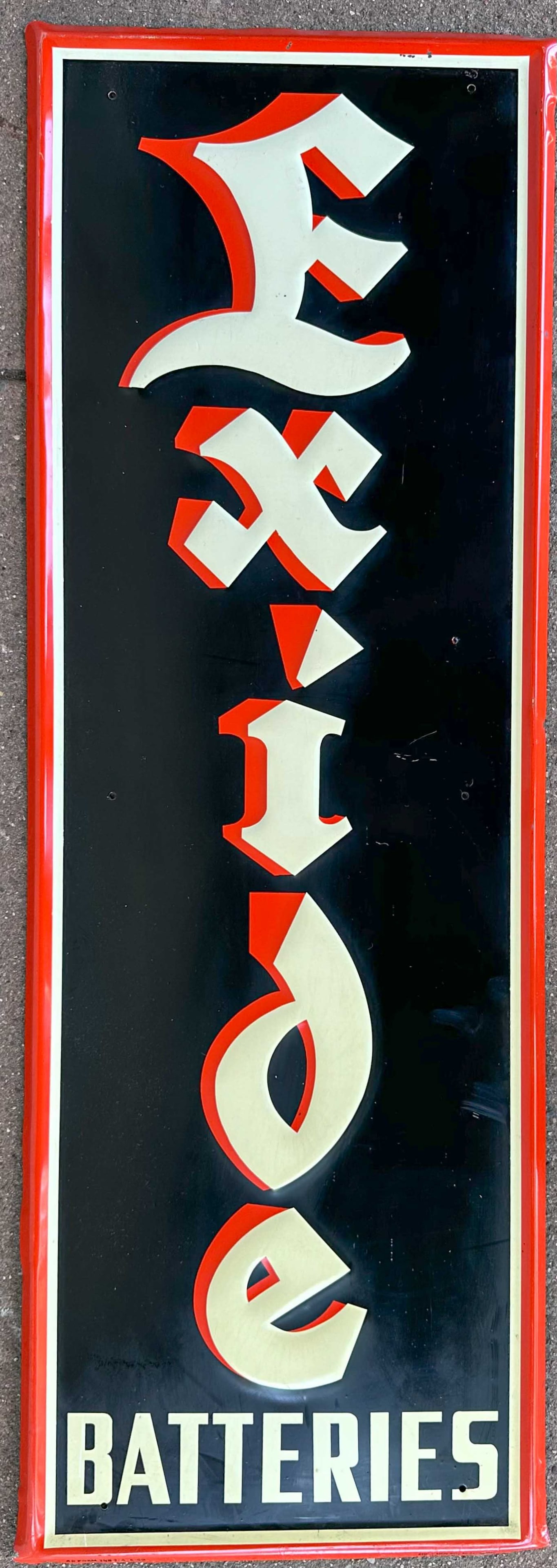 Battery Sign: Excide Battery sign, painted tin, formed frame edges, 14 x 40.