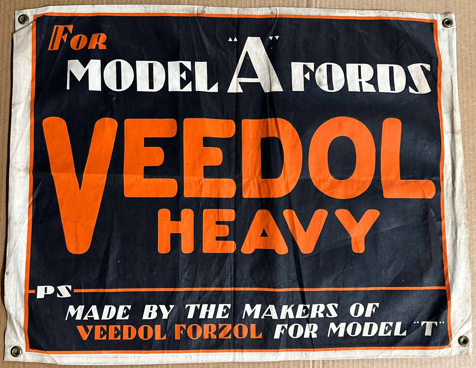 Veedol Banner: Veedol Oil For Model "A" Fords hanging banner, mentioned previous use for Model "T", colorful, grommet at each corner, 29.5 x 23.