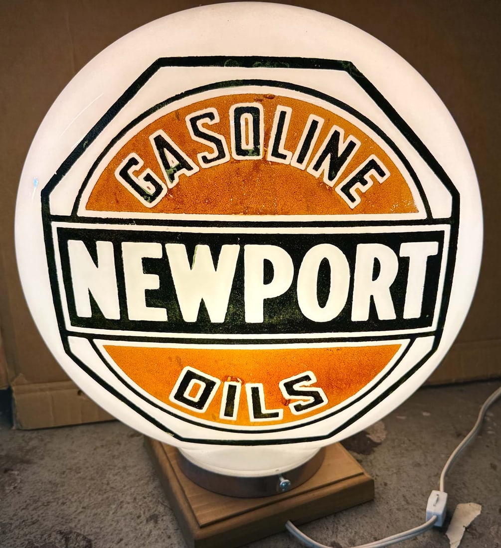 Gas Globe: Newport gas globe, one piece milk glass, illuminated, 16 dia, 19 high.