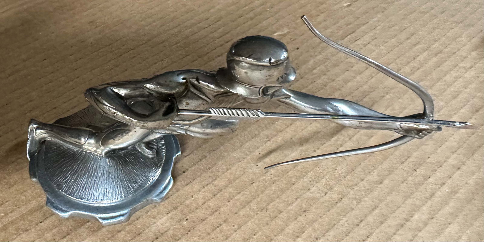 Hood Ornament: 1928 - 1929 Pierce Arrow hood ornament, mounted on cap for display, Williams #211.