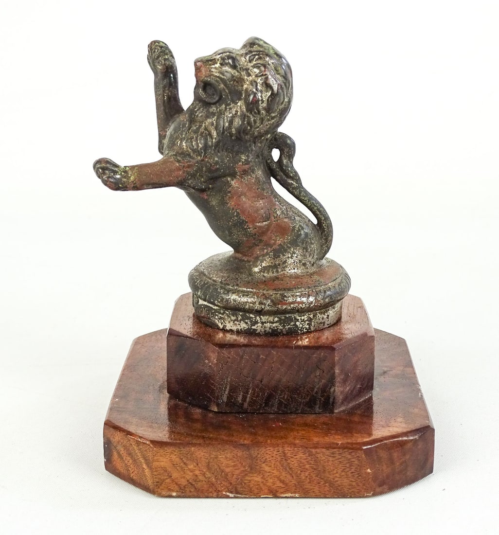 1924 Franklin Lion Radiator Mascot: 1924 Franklin Lion Radiator mascot on wooden base. 6 1/2" Ht..