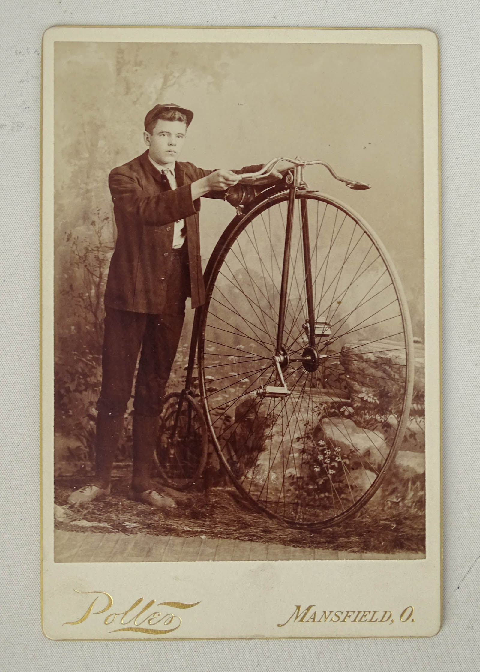 Columbia Roadster Photo: Photograph: Boy posing with Columbia light roadster high wheel 1886. Good condition. Glenn Eames Collection Burlington Vermont.