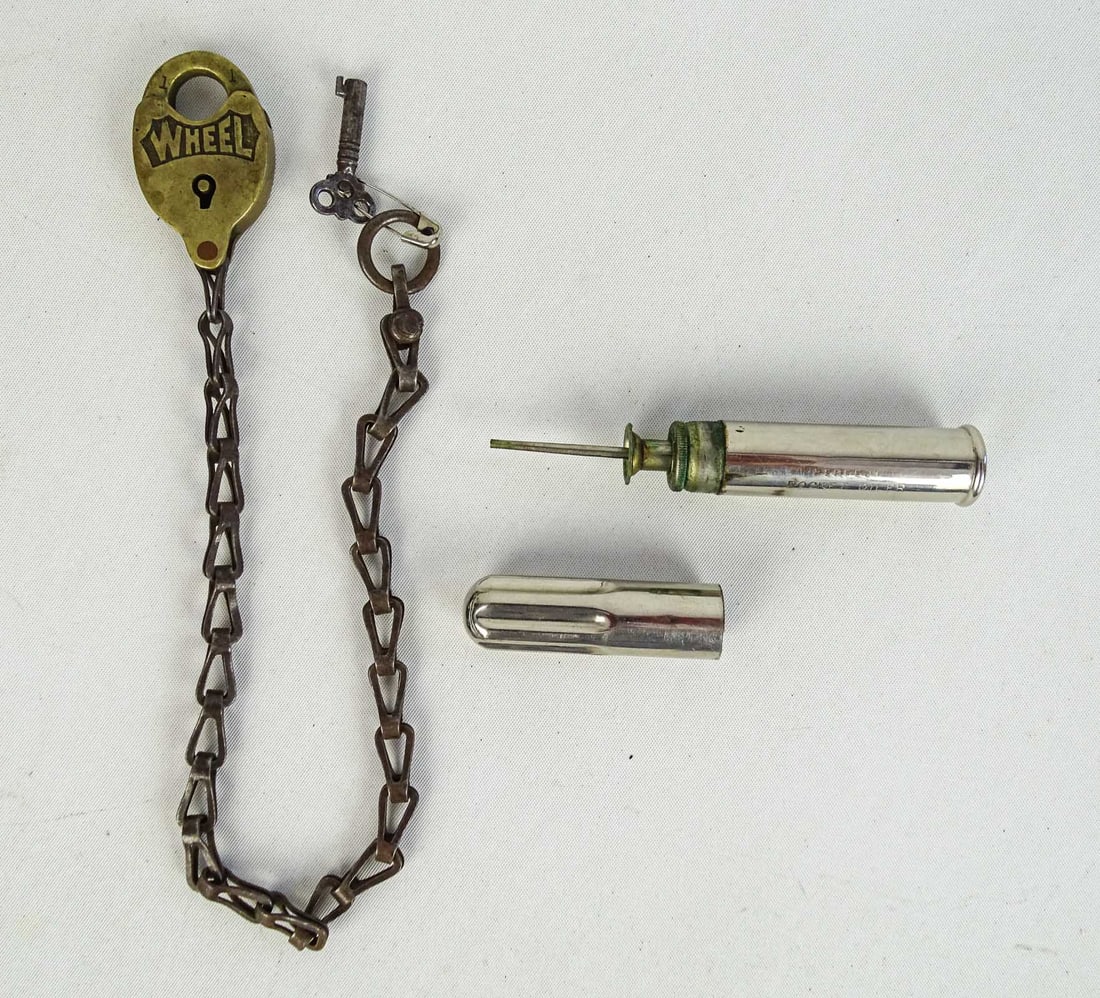 Columbia Bicycle Lock: Lot 28 the "wheel" lock for high wheel bicycle w/ key - works. The perfect pocket oiler - Pope Mfg Co. Columbia Boston both mid 1880's. 2 items. Good condition. Glenn Eames Collection Burlington