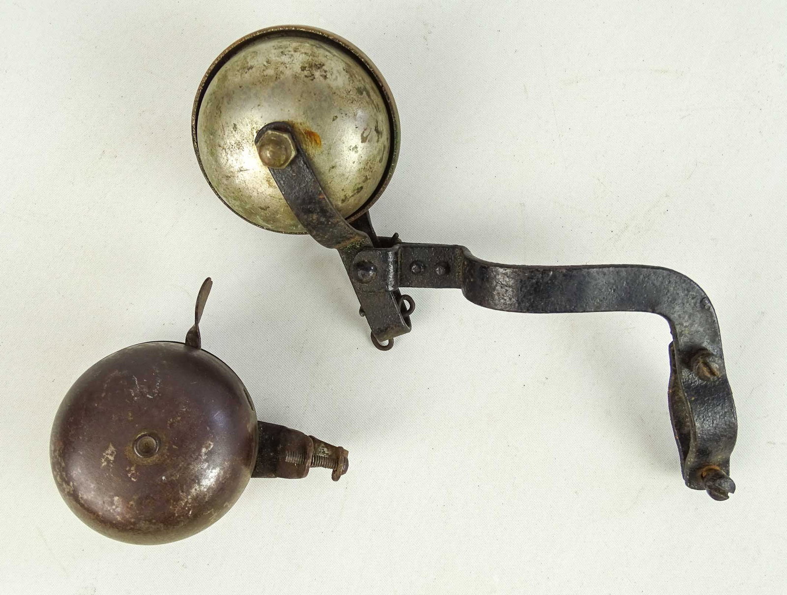 Antique Bicycle Bells: Bell lot, one front wheel bell unmarked - one Star Bros bell both early 1900's. For 2 bells. Good condition. Glenn Eames Collection Burlington Vermont.