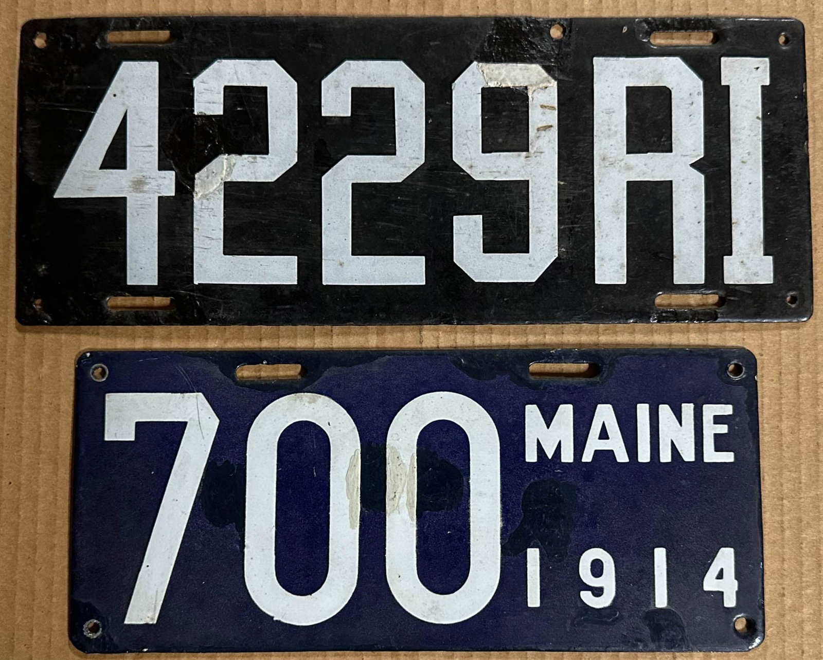License Plates: Ca 1908 - 1911 Rhode Island license plate #4229 and 1914 Maine #700 plate, both have some touch up.