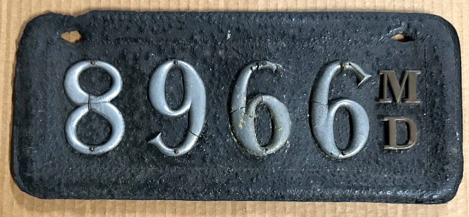 License Plate: Maryland leather license plate,#8966, pre 1910.